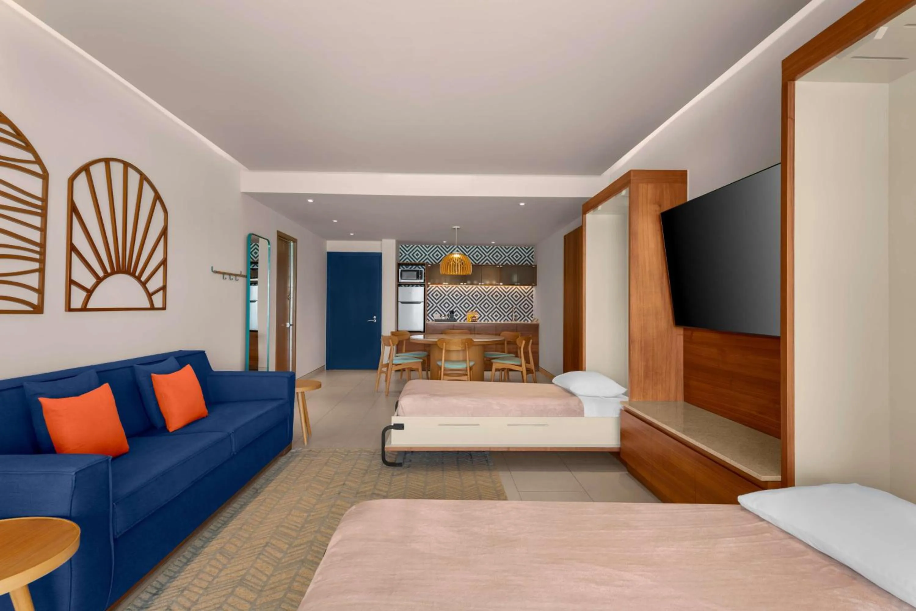 Living room, Bed in Hilton Cancun Mar Caribe All-Inclusive Resort