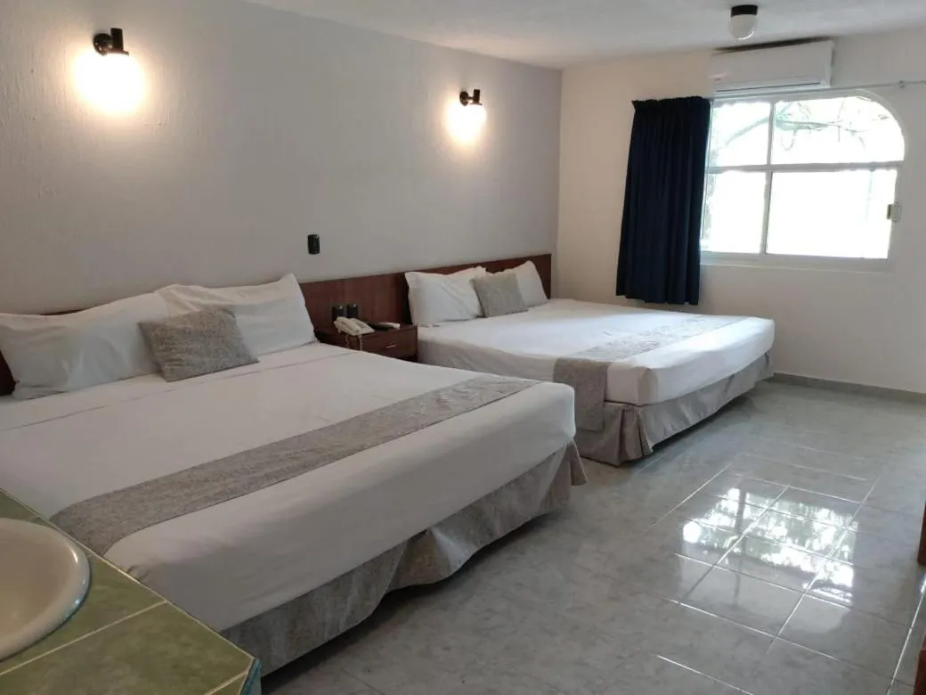 Bed in Dorados Conventions & Resort