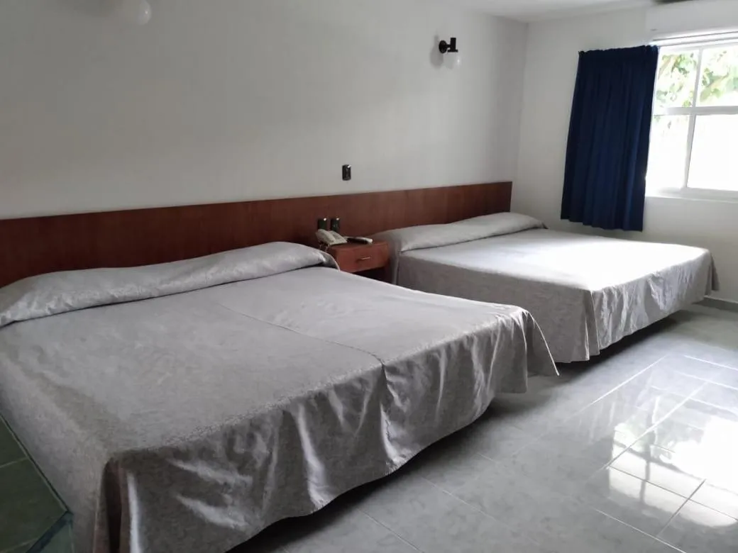 Bed in Dorados Conventions & Resort