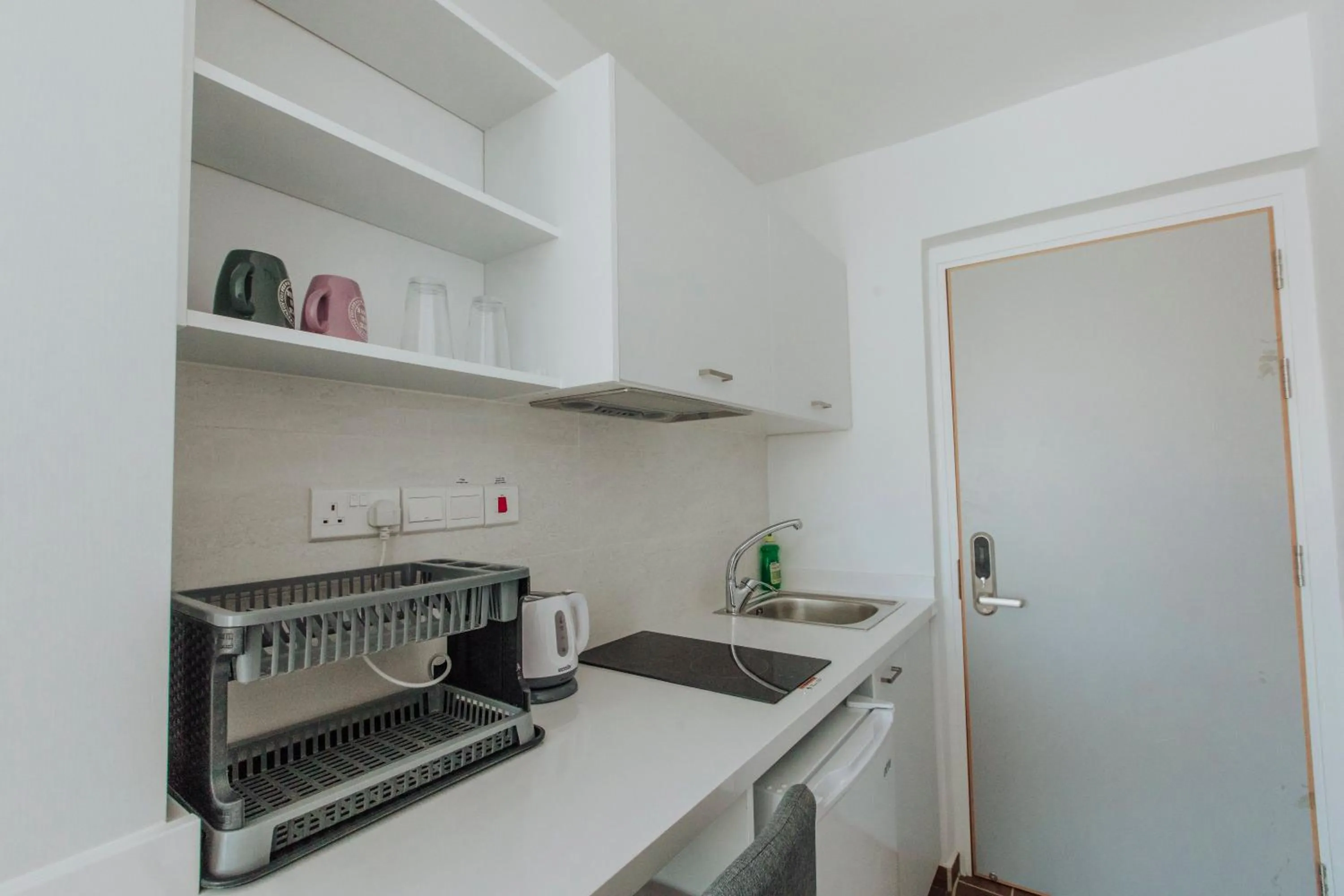 Kitchen or kitchenette in River View Boutique Apts