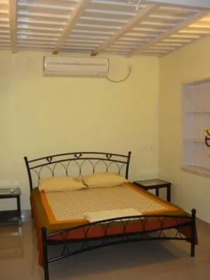 Bed in Palm Grove Service Villa