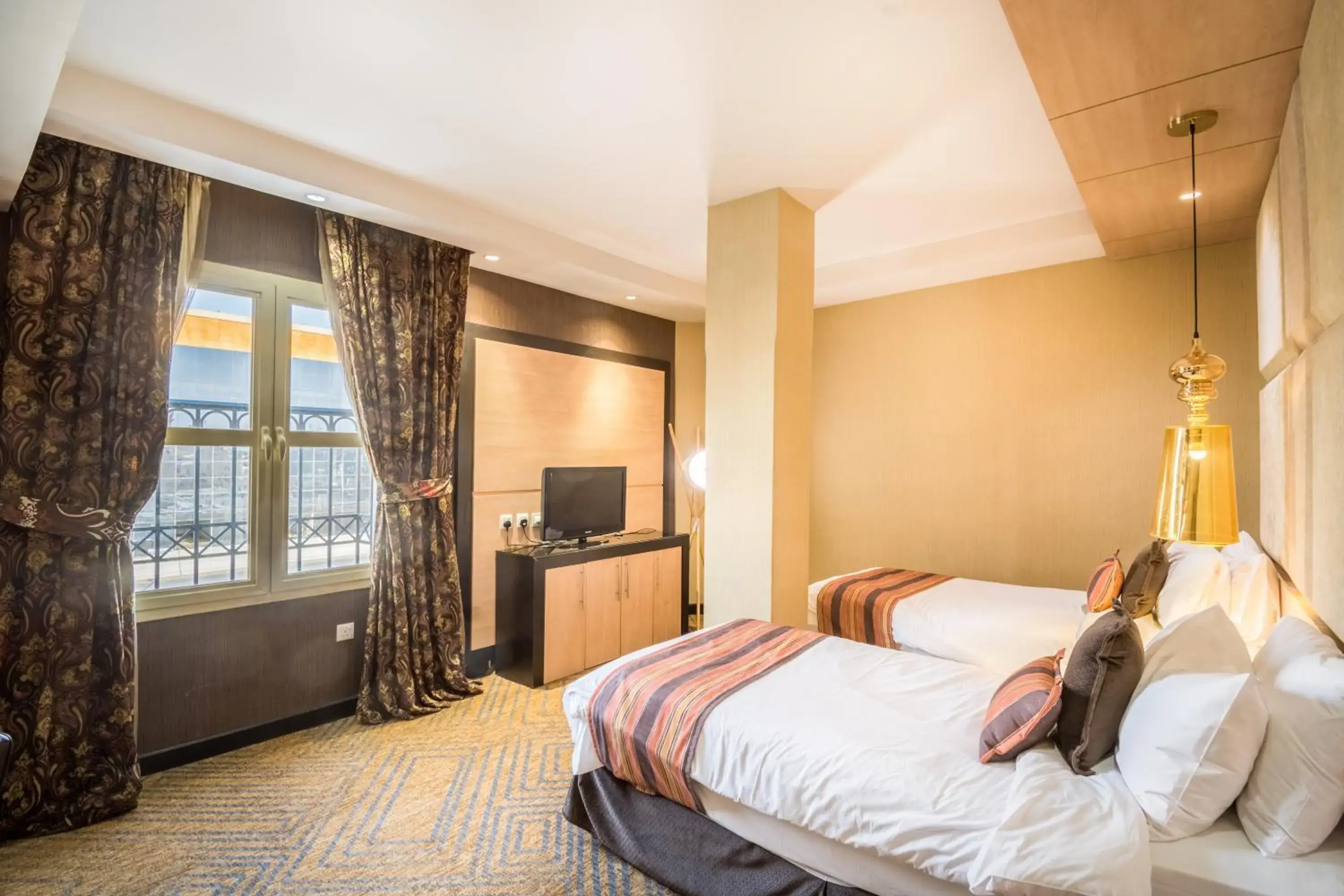 Bedroom, Bed in Grand Plaza Hotel - Takhasosi Riyadh Bedroom, Bed in Grand Plaza Hotel - Takhasosi Riyadh