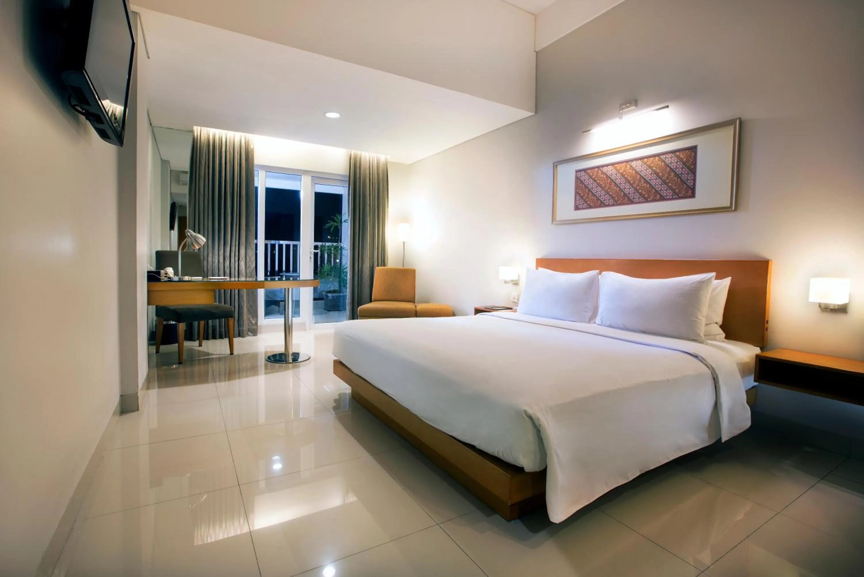 Bedroom, Bed in The Capital Hotel Surabaya