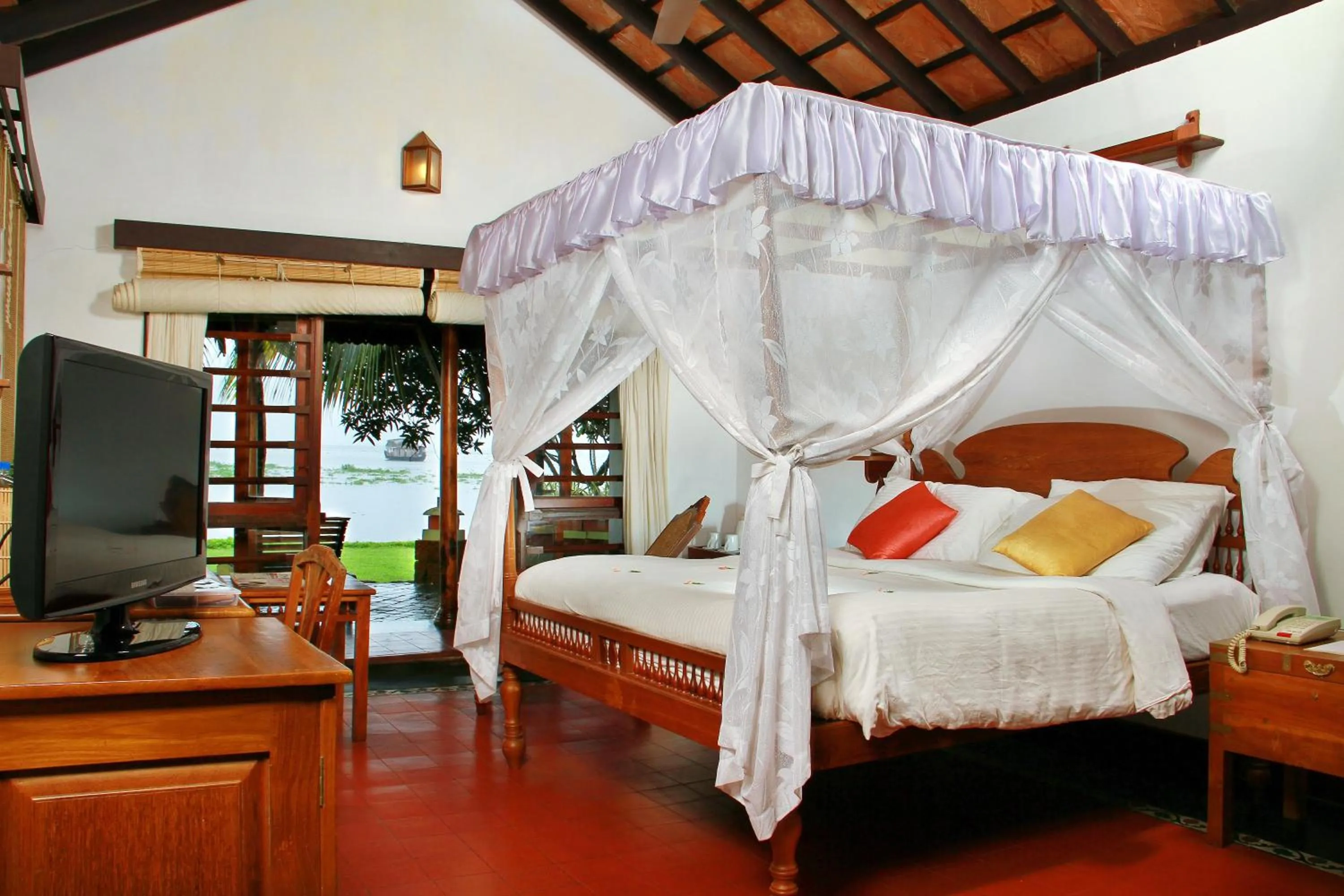 Bed in Punnamada Resort