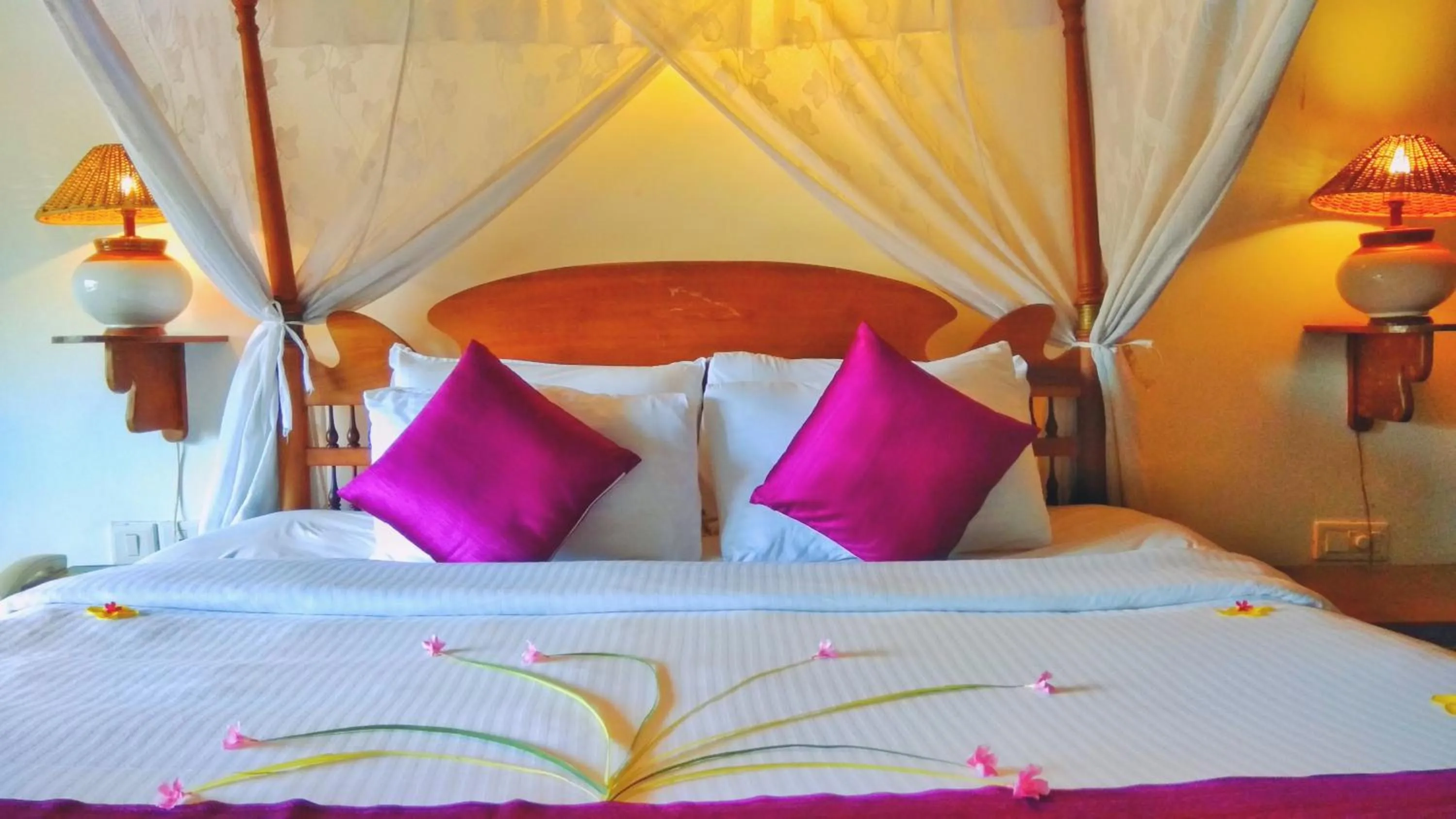 Bed in Punnamada Resort