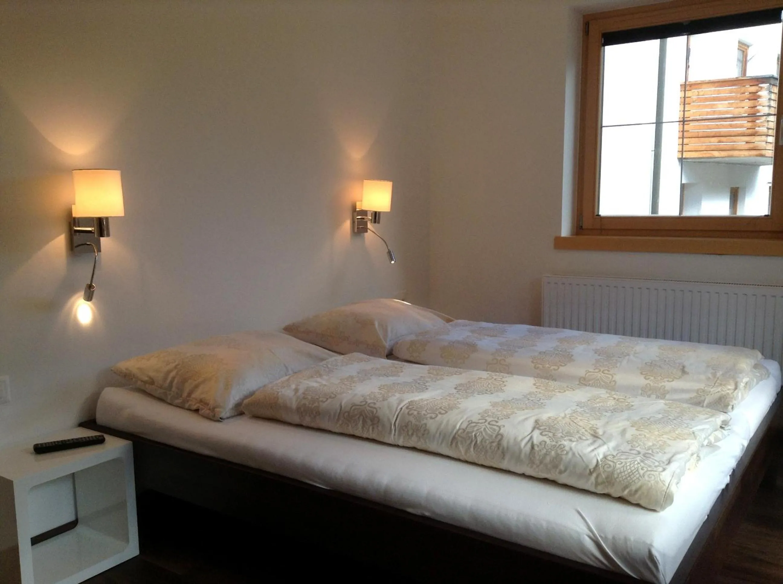 Bed in Chasa Sulai Appartements