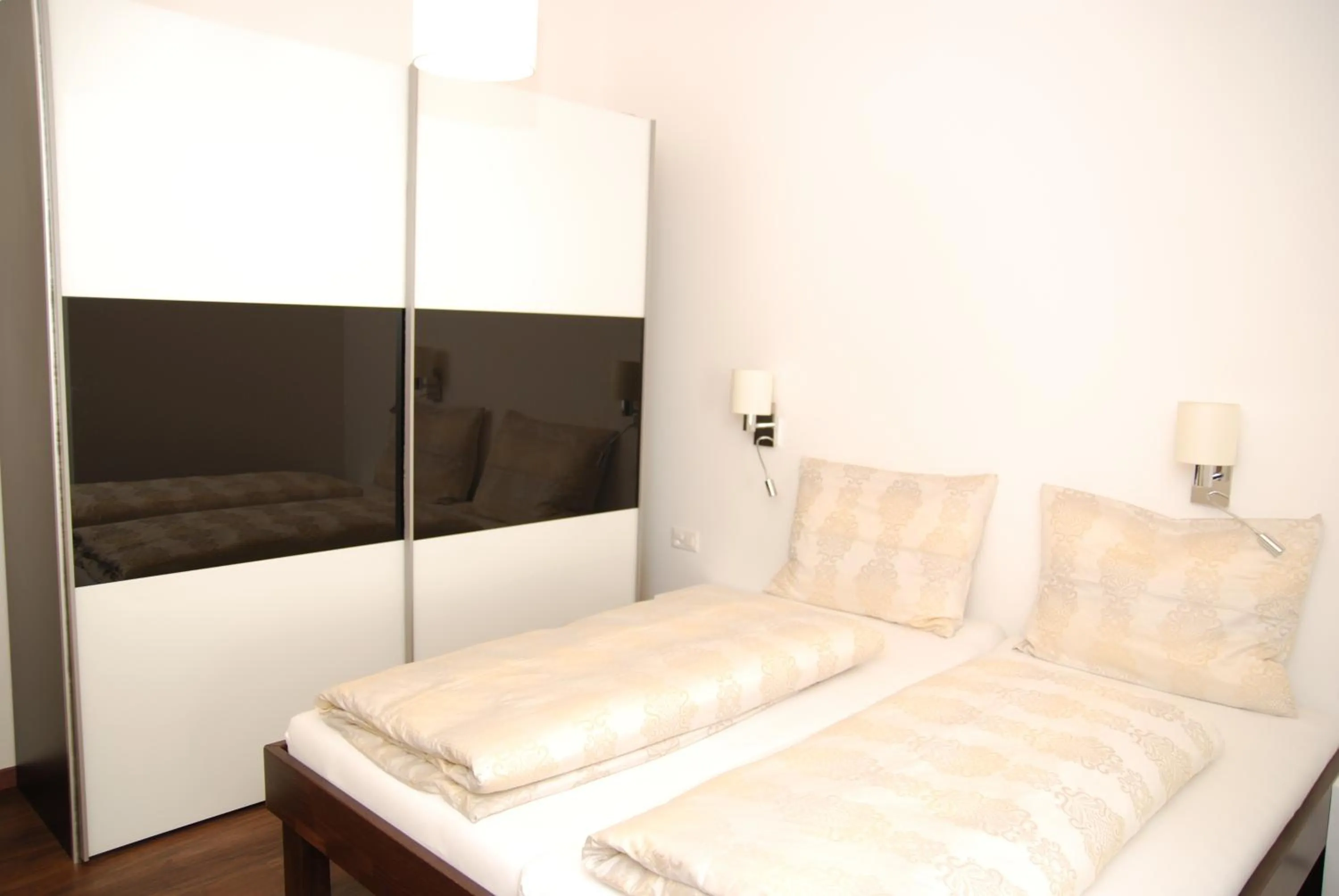 Bed in Chasa Sulai Appartements