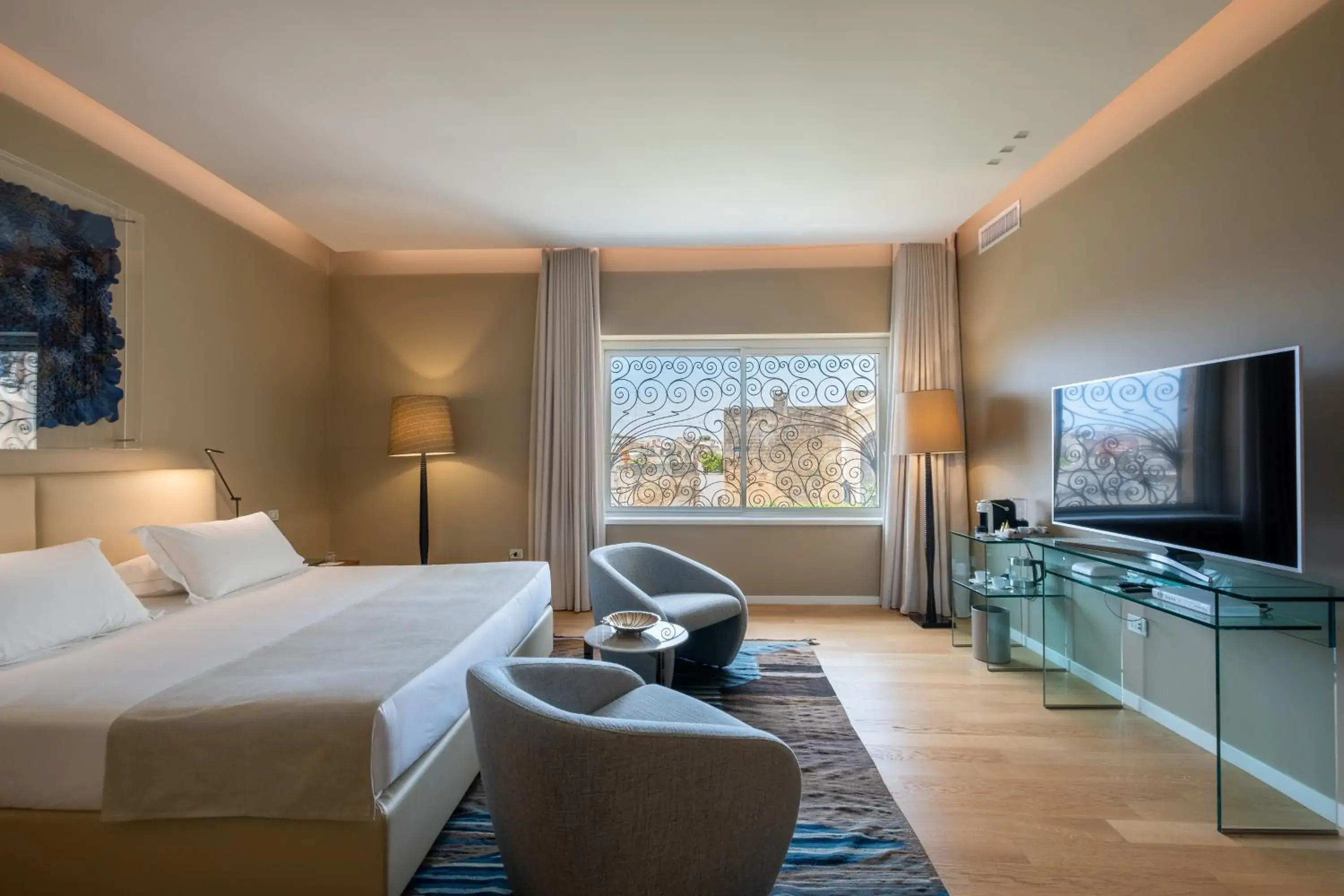 Junior Suite with City View in La Fiermontina Palazzo Bozzi Corso Hotel Junior Suite with City View in La Fiermontina Palazzo Bozzi Corso Hotel