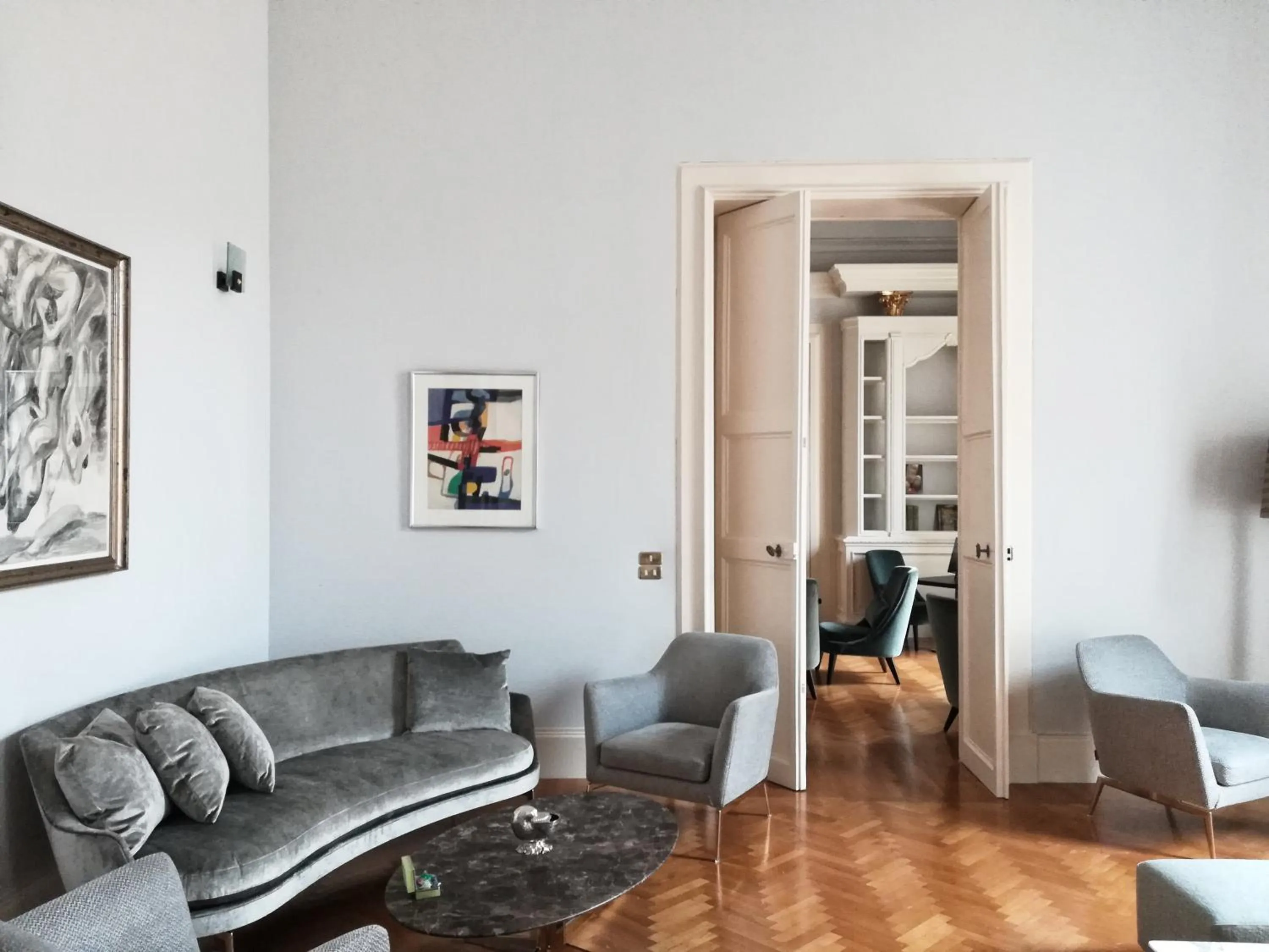 Communal lounge/ TV room in La Fiermontina Palazzo Bozzi Corso Hotel