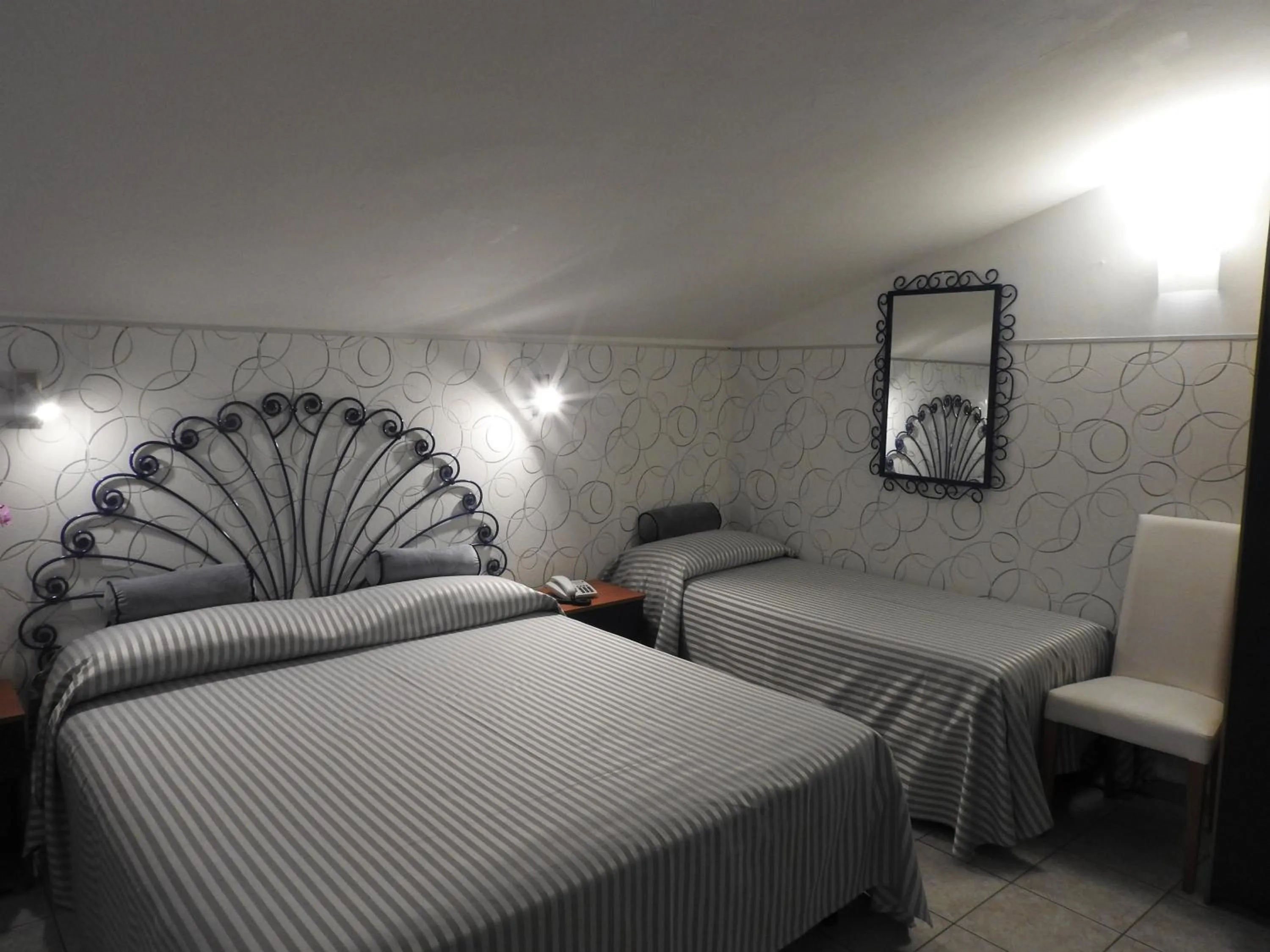 Bed in Hotel Il Gioiello
