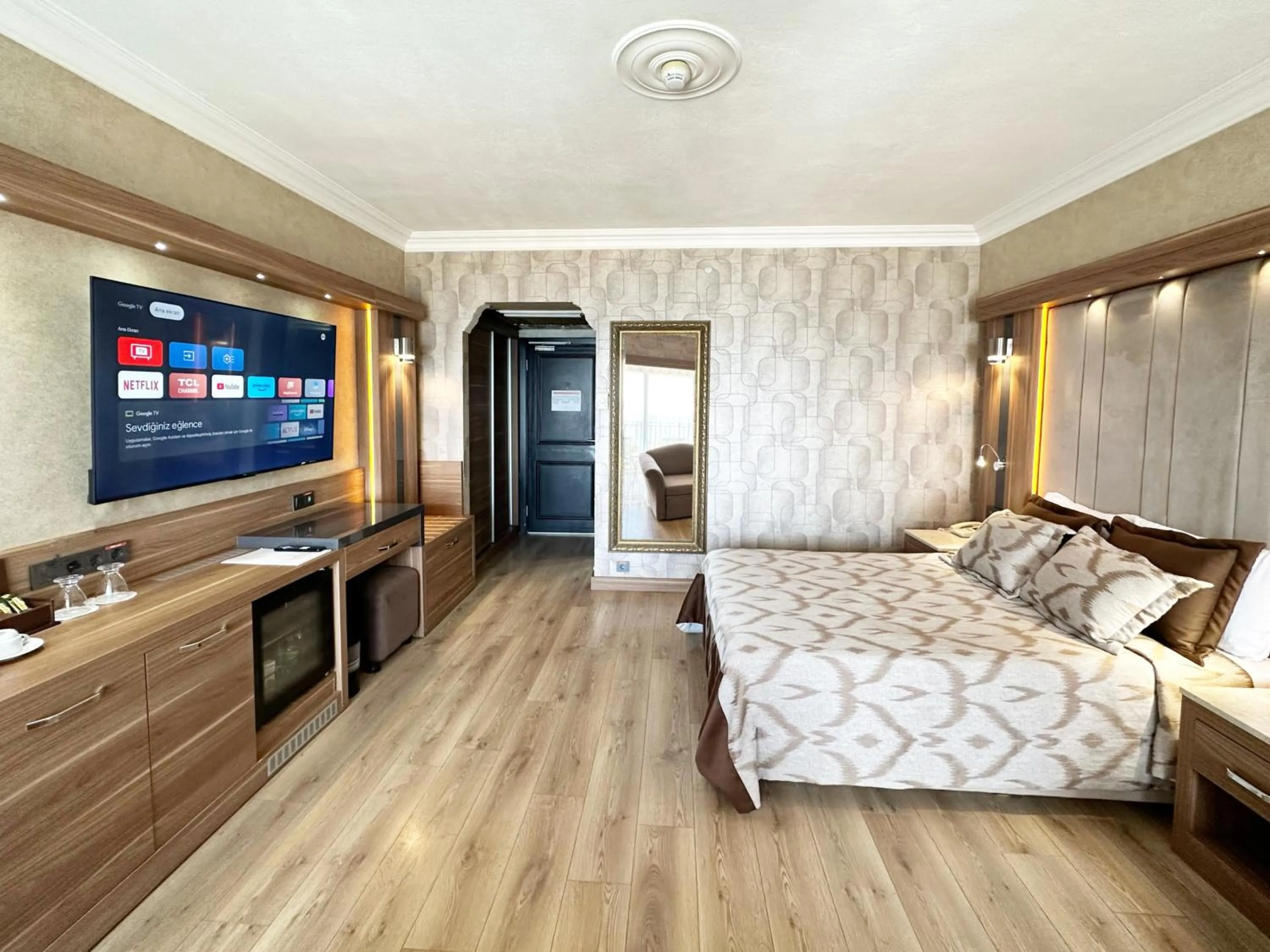 Bed in LAUR HOTELS Experience & Elegance