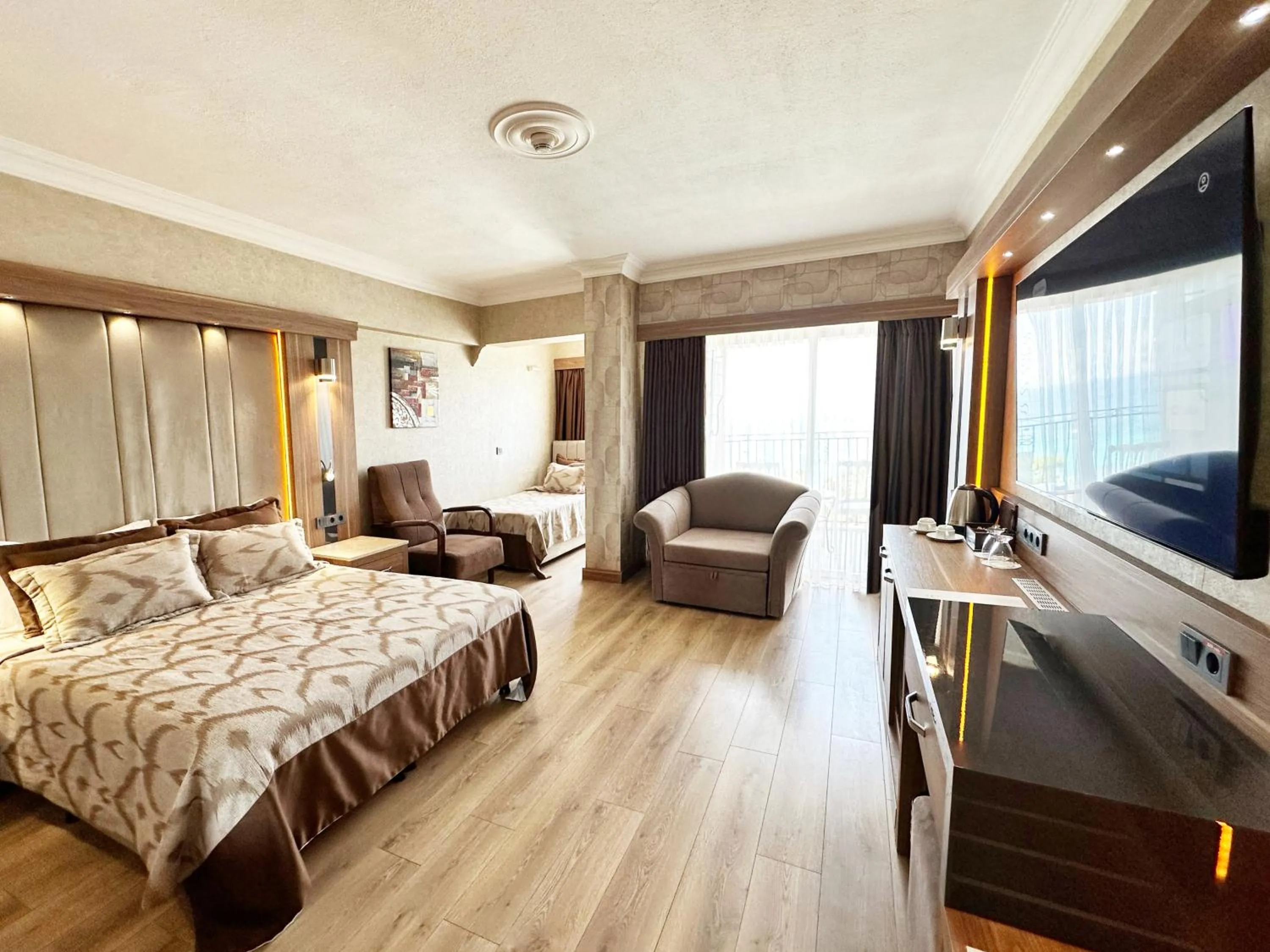 Bed in LAUR HOTELS Experience & Elegance