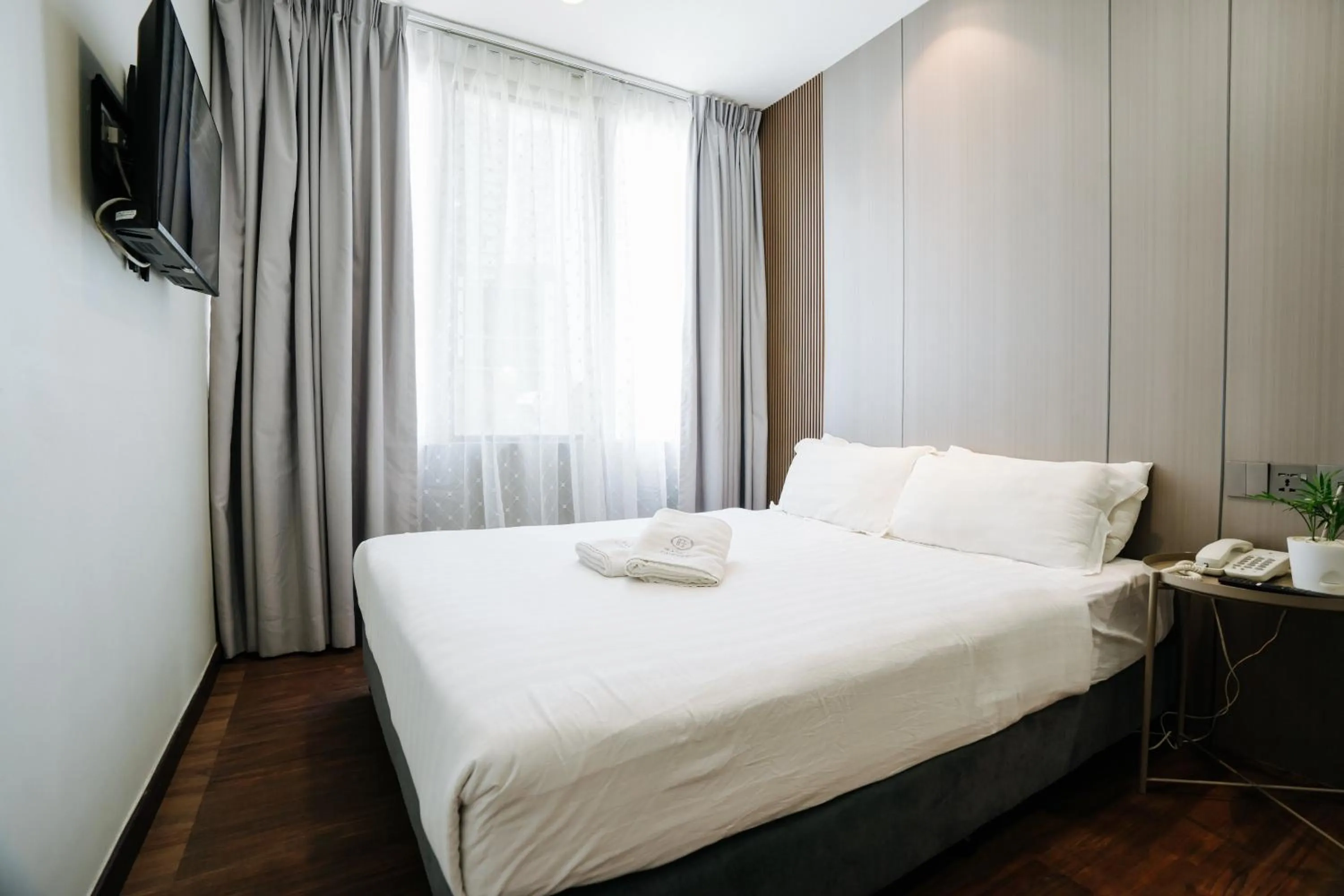 Bed in Wangs Hotel Gurney Drive