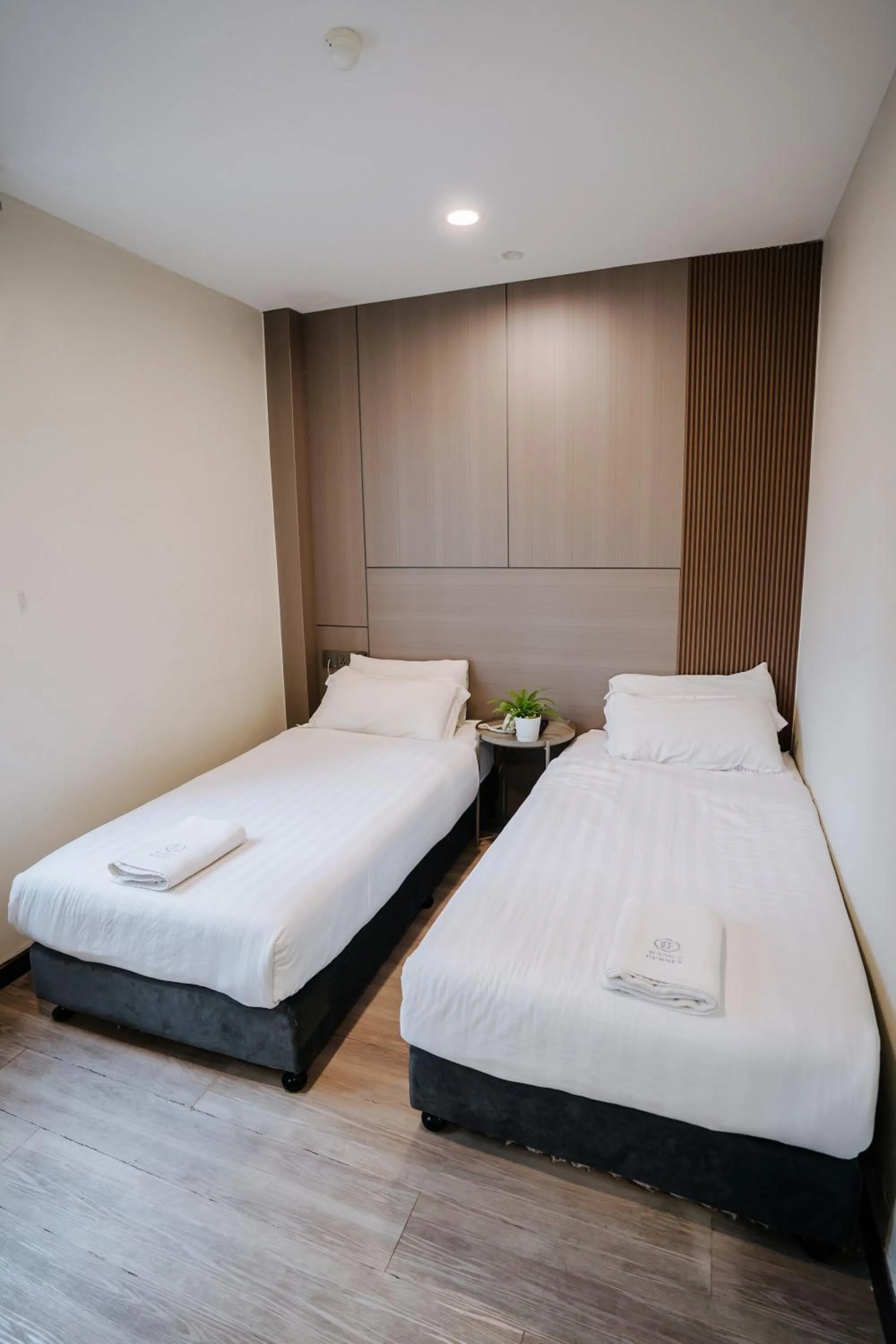 Bed in Wangs Hotel Gurney Drive