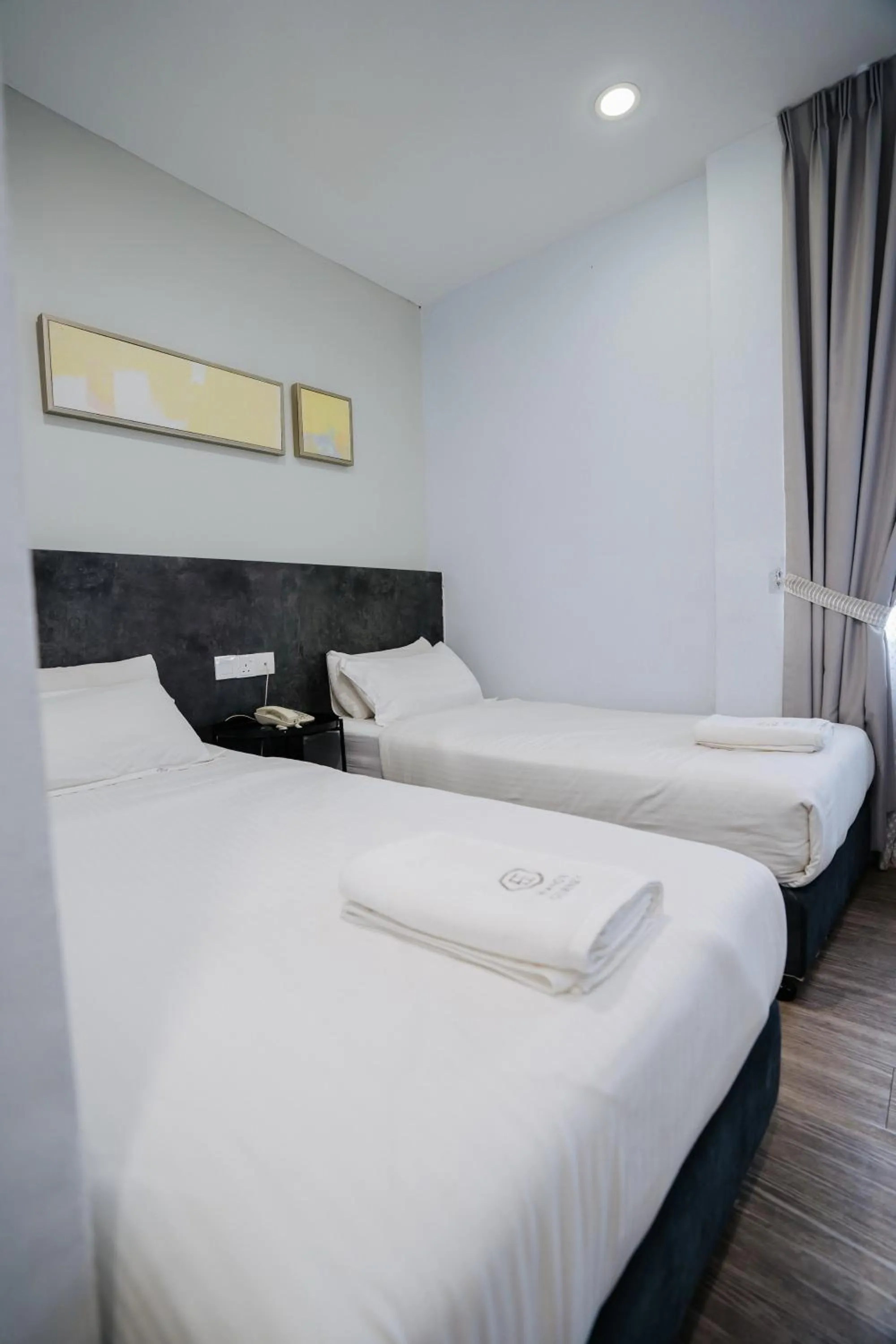 Bed in Wangs Hotel Gurney Drive