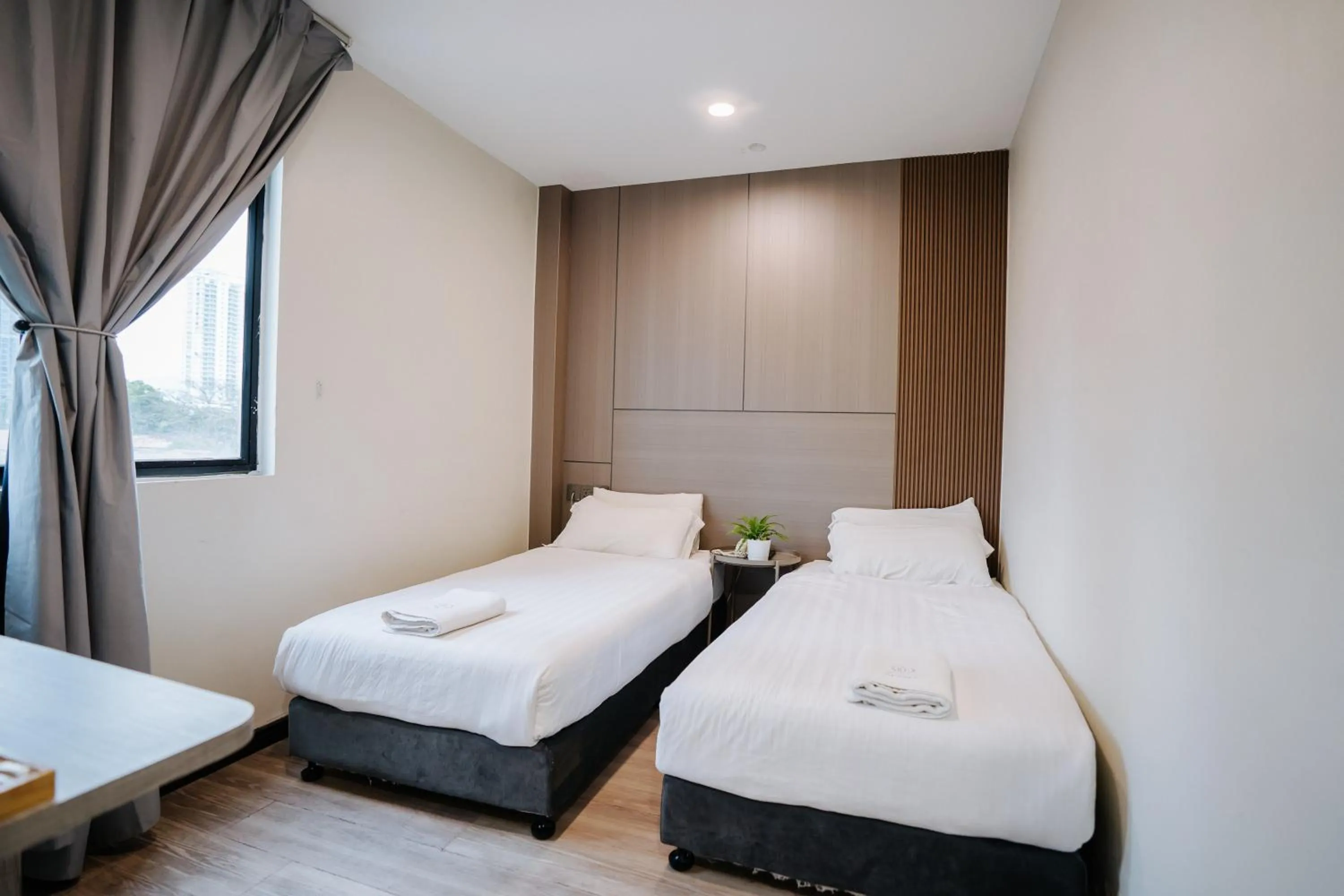 Bed in Wangs Hotel Gurney Drive