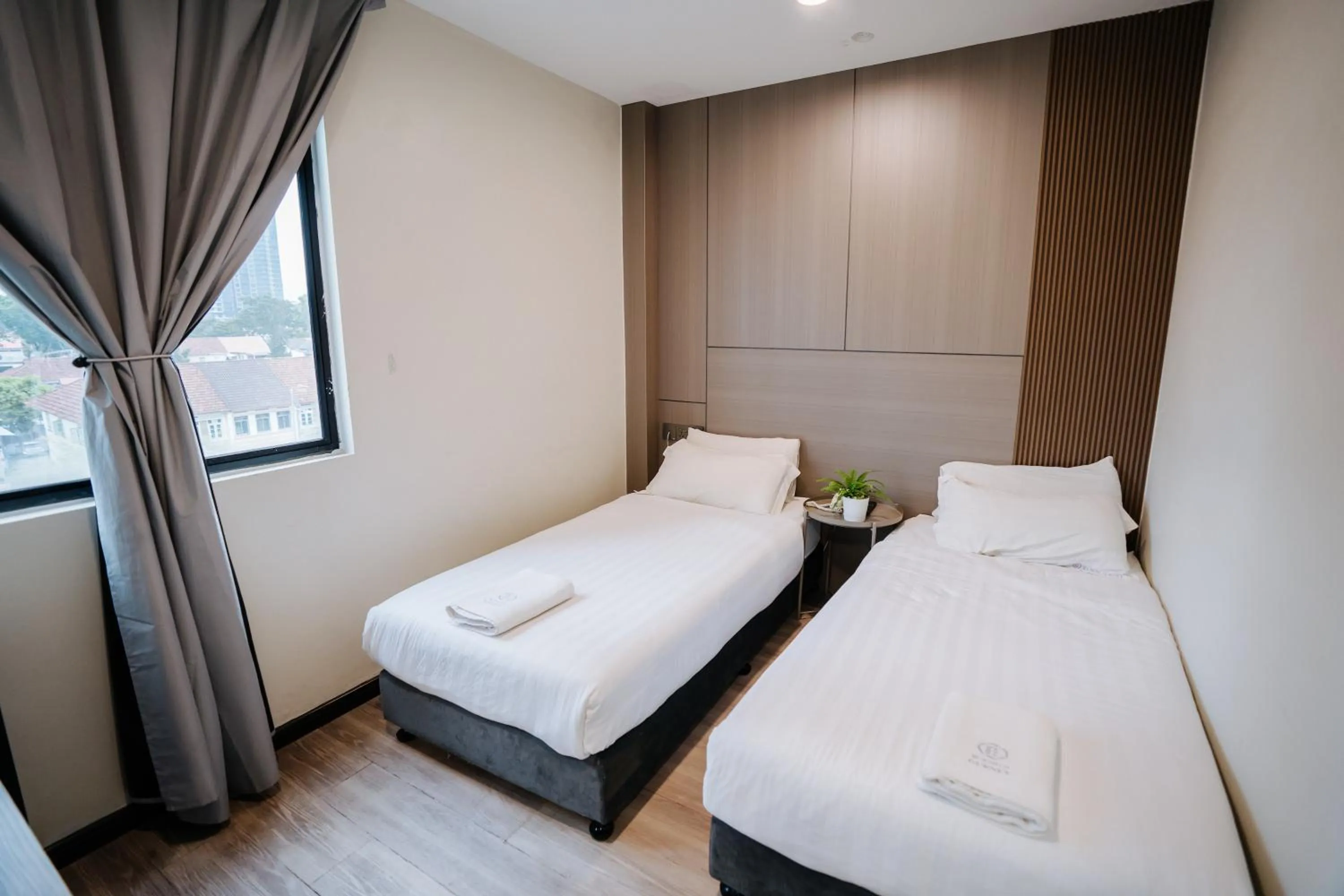 Bed in Wangs Hotel Gurney Drive