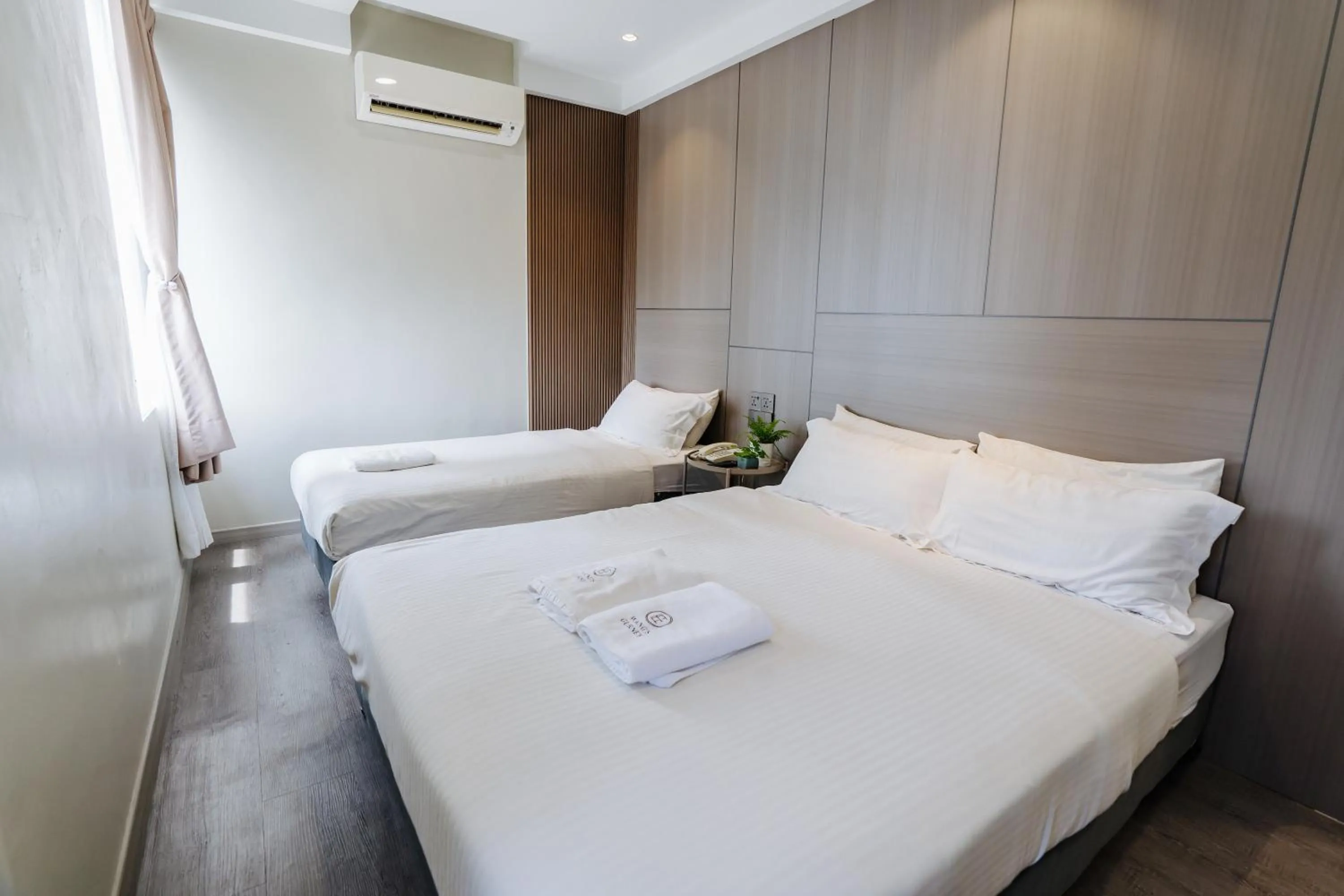 Bed in Wangs Hotel Gurney Drive