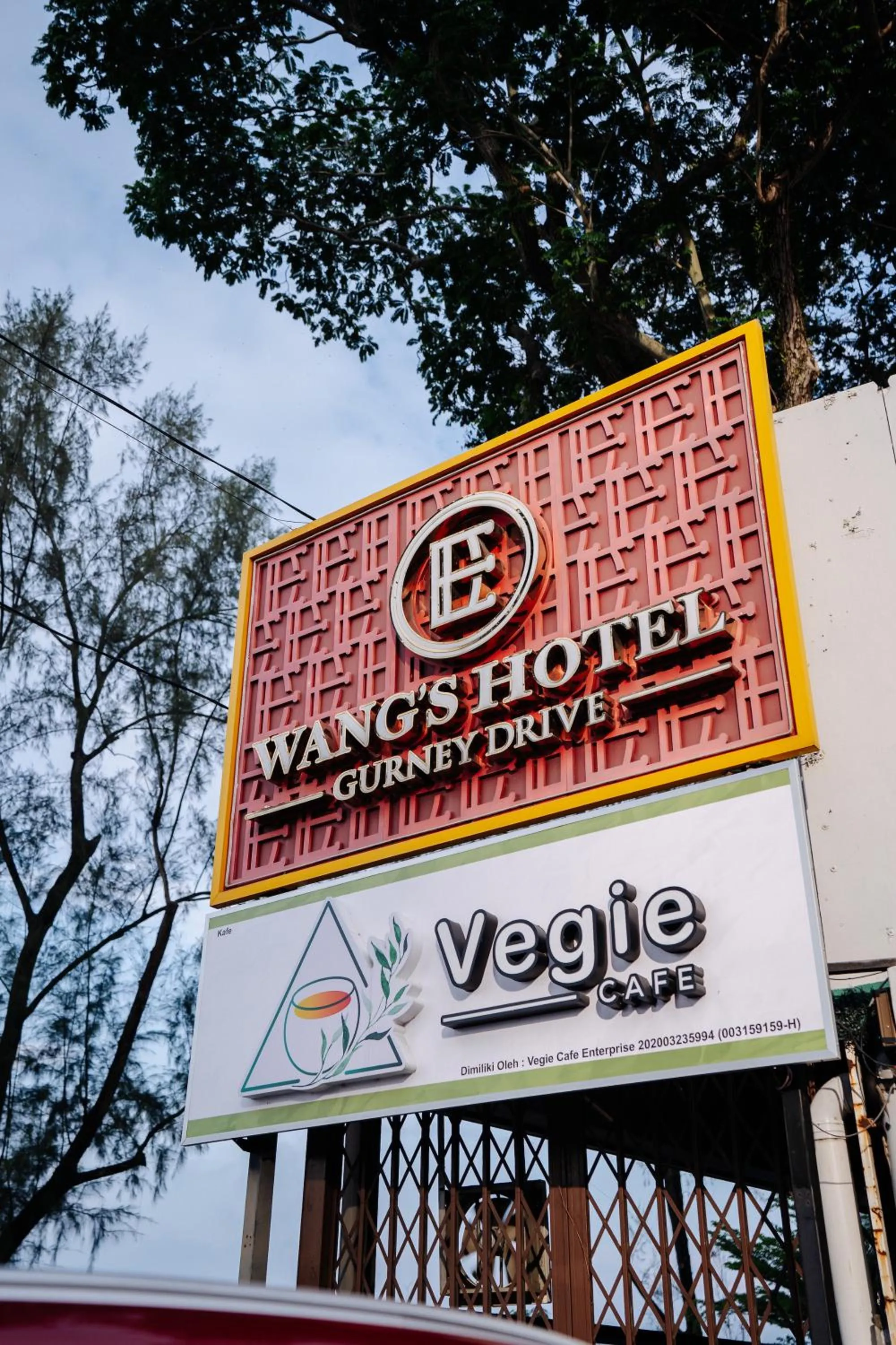 Property logo or sign in Wangs Hotel Gurney Drive