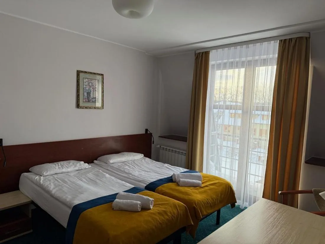 Bed in Hotel Aleksander