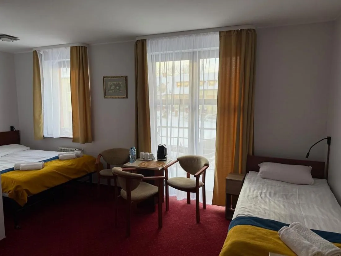 Bed in Hotel Aleksander