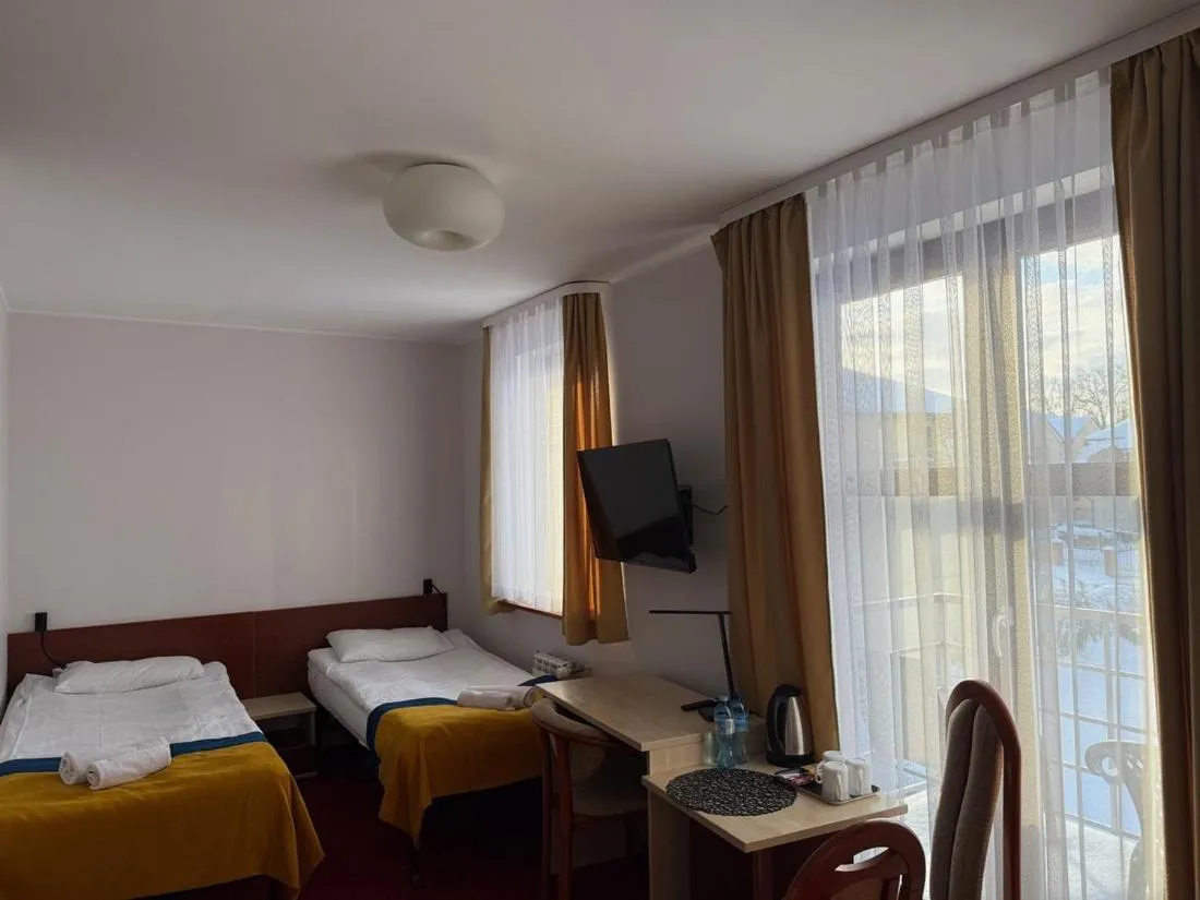 Bed in Hotel Aleksander