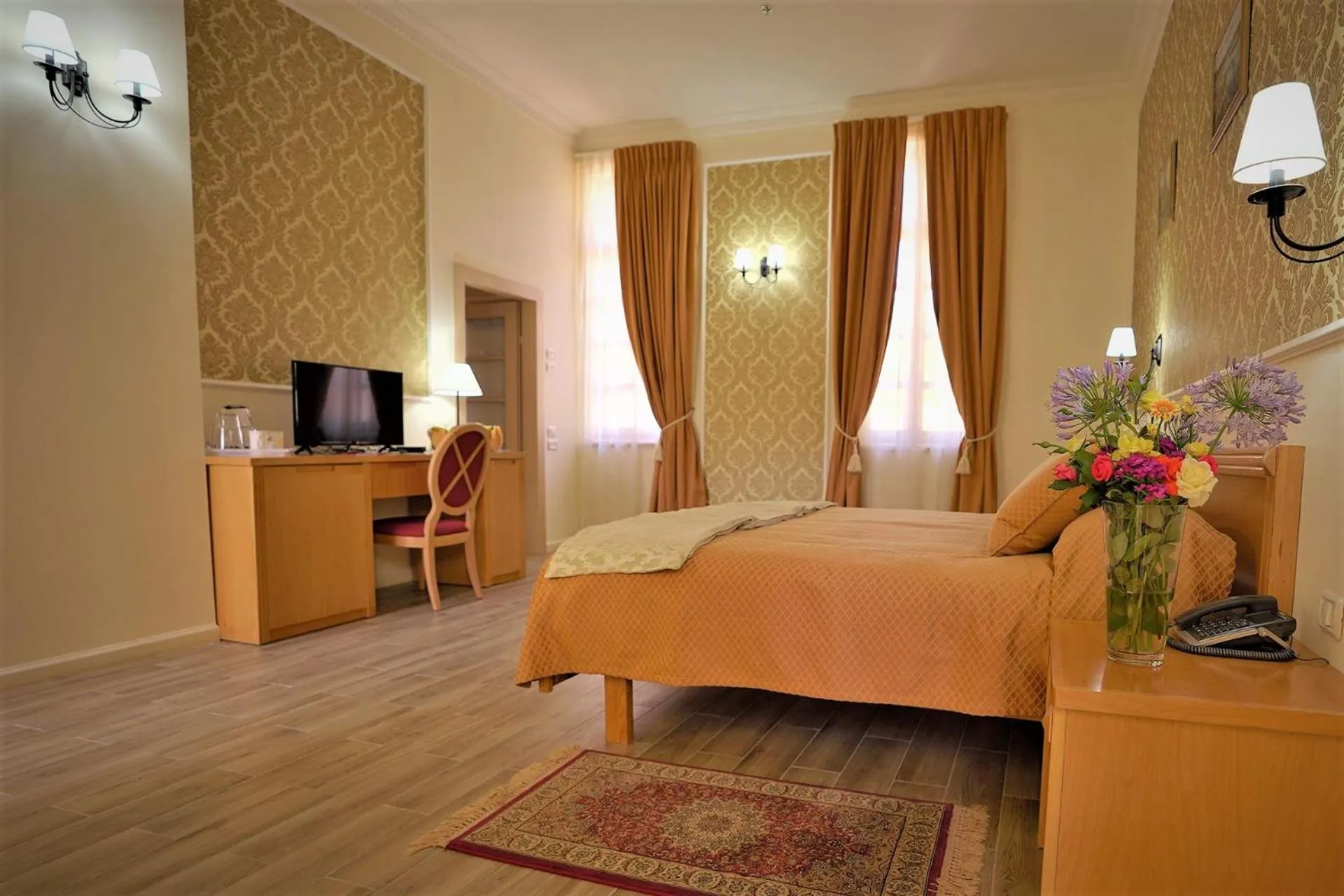 Bed in Sergei Palace Hotel