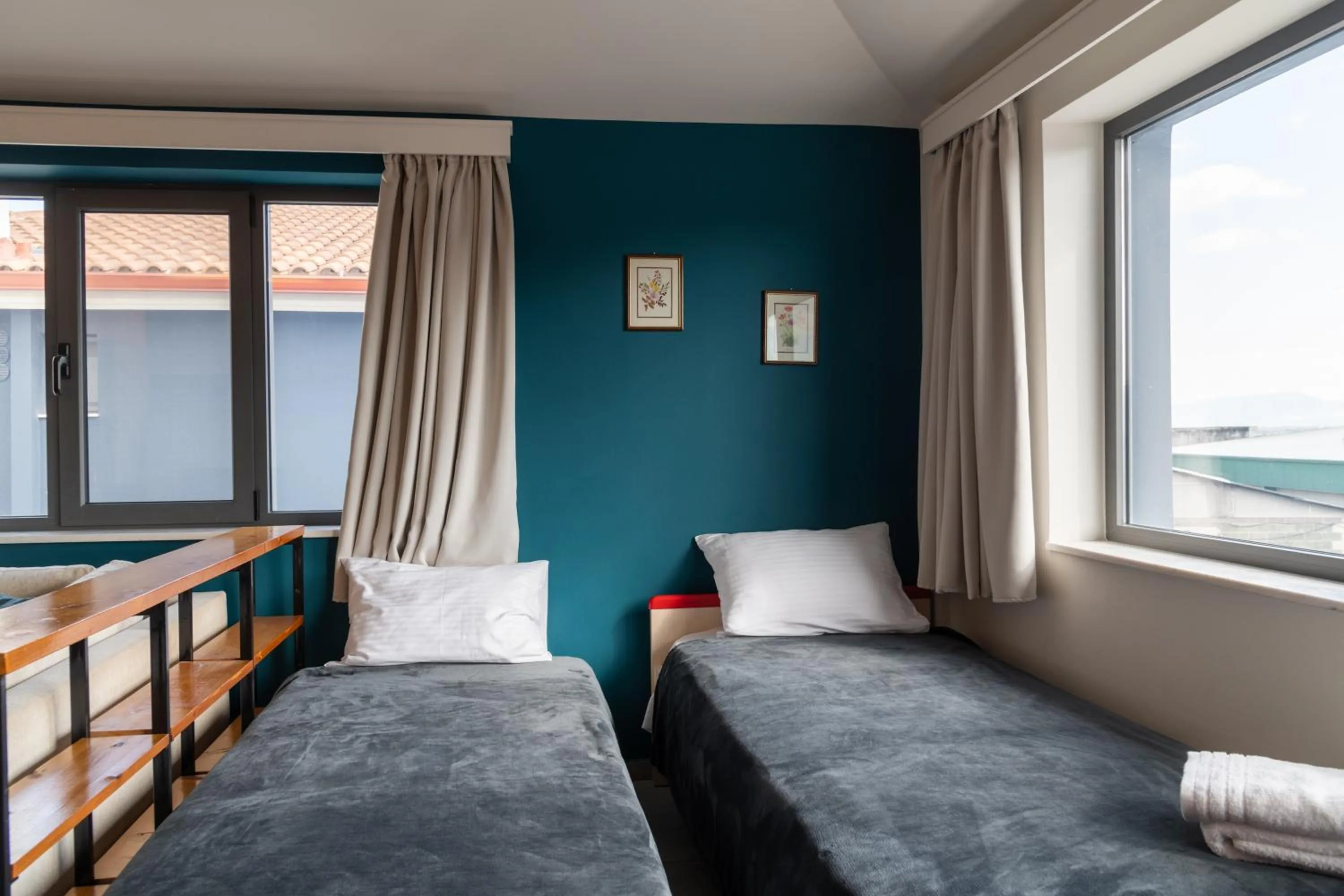 Bed in CHROMA Lodge Pikermi