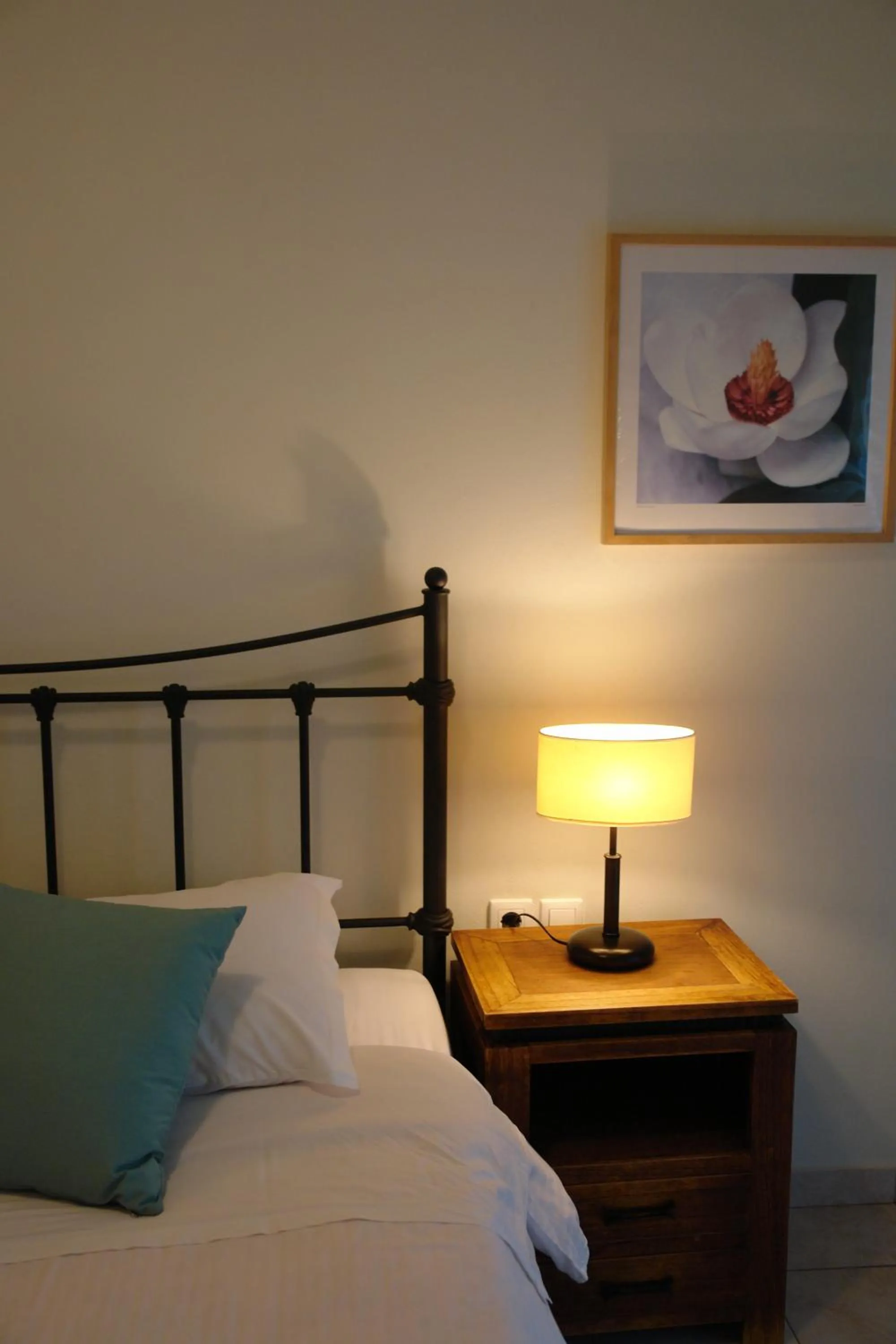 Bed in Oasis Beach Hotel