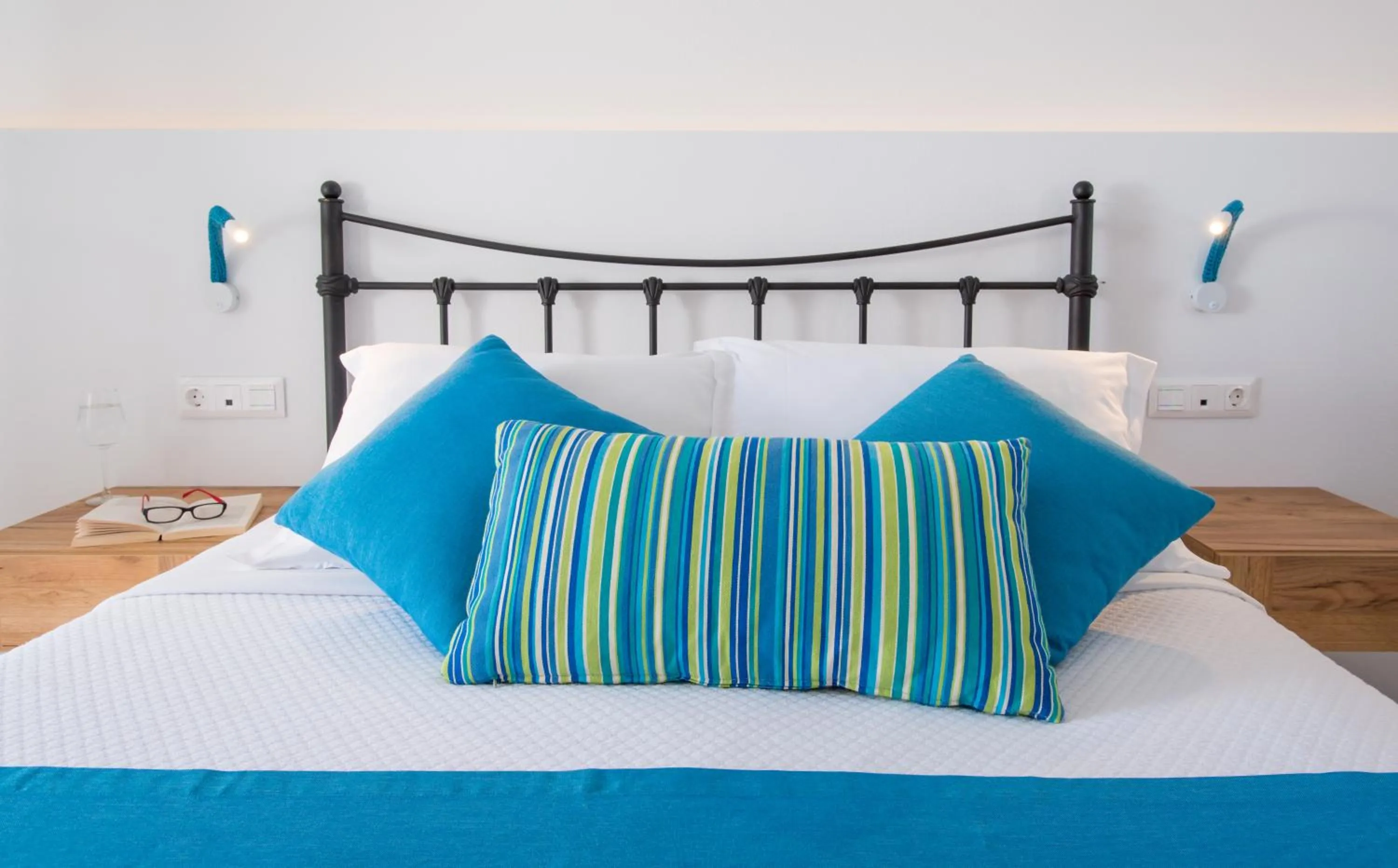 Bed in Oasis Beach Hotel