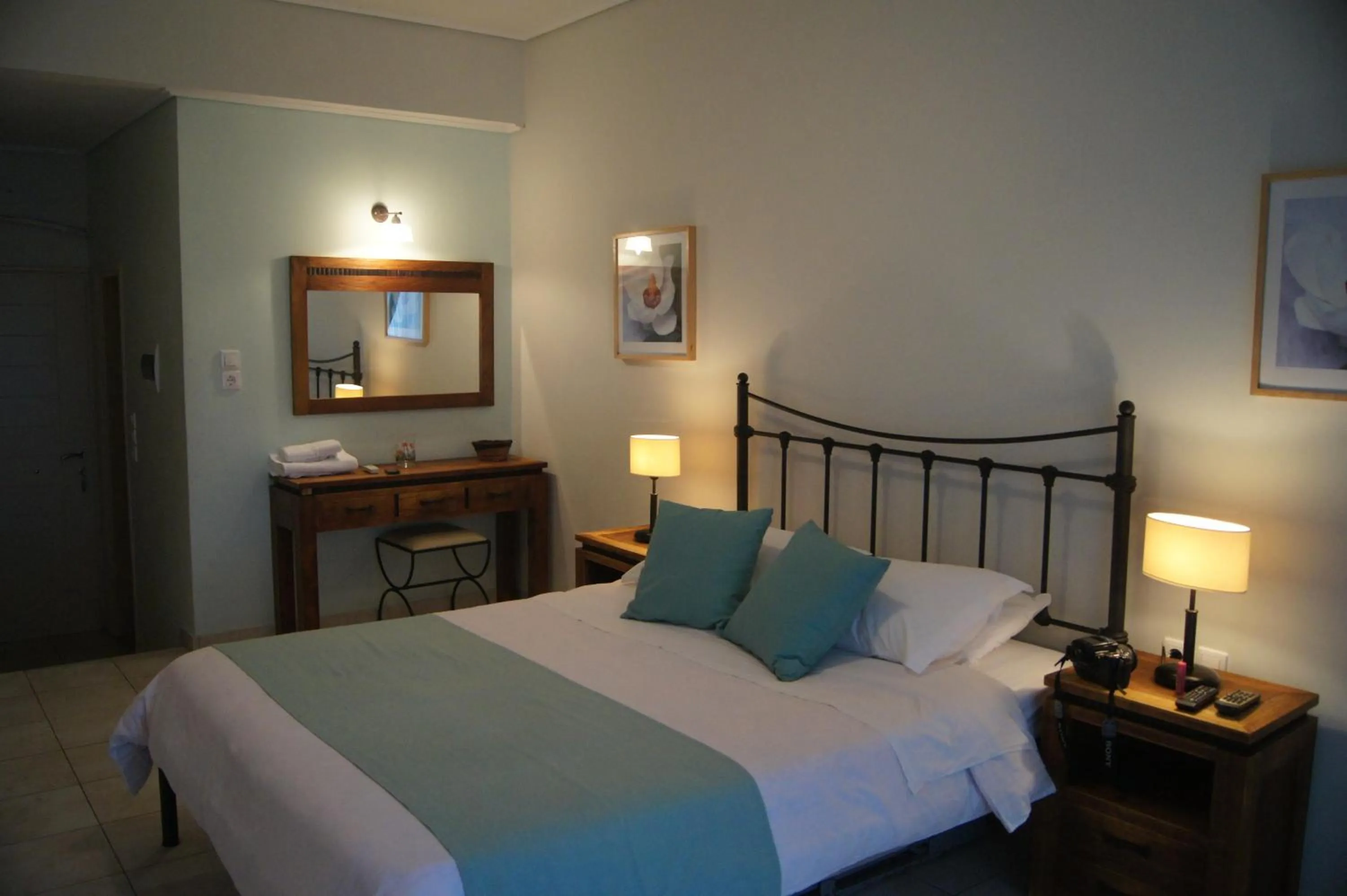 Bed in Oasis Beach Hotel