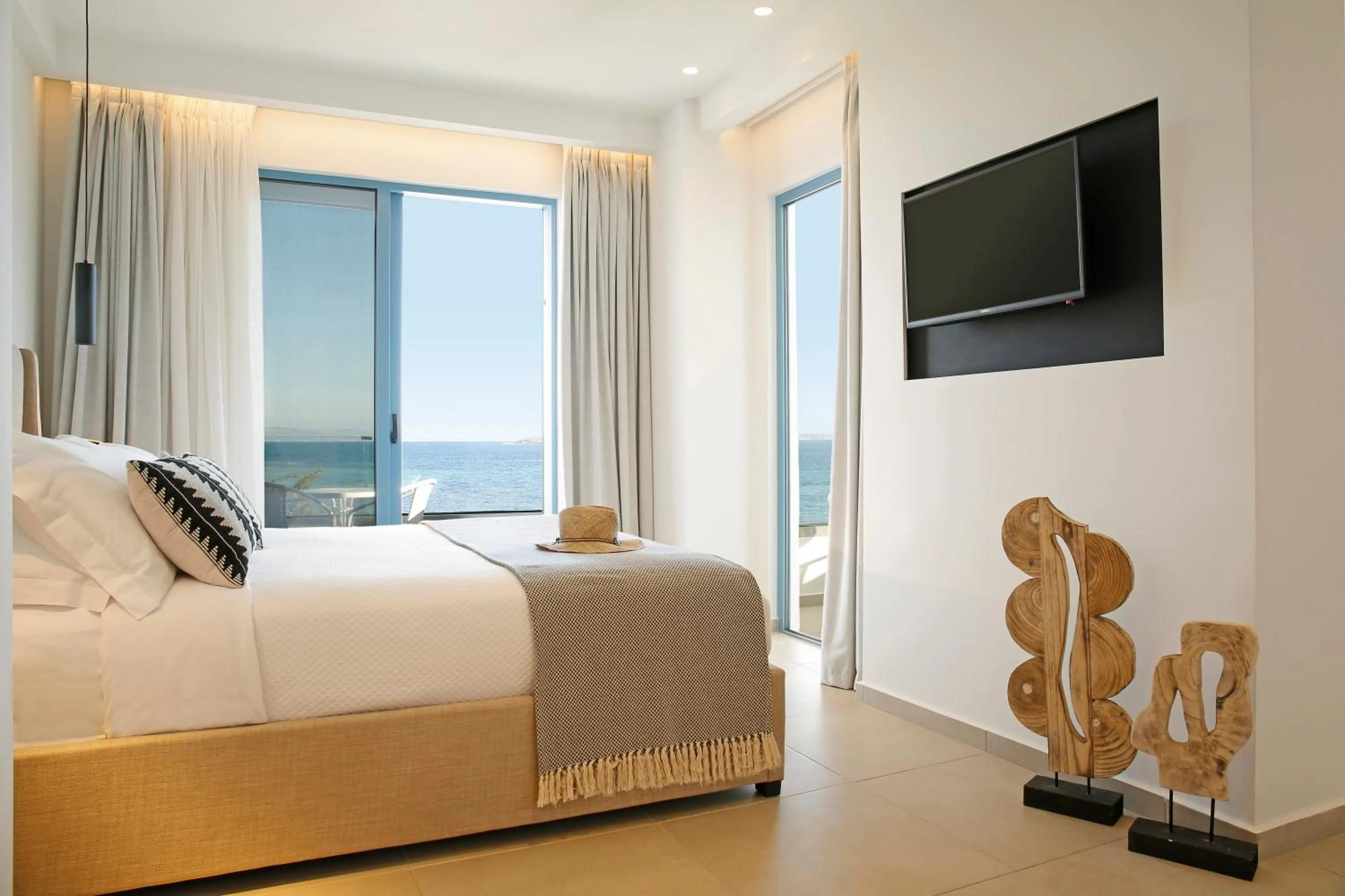 Bed in Oasis Beach Hotel