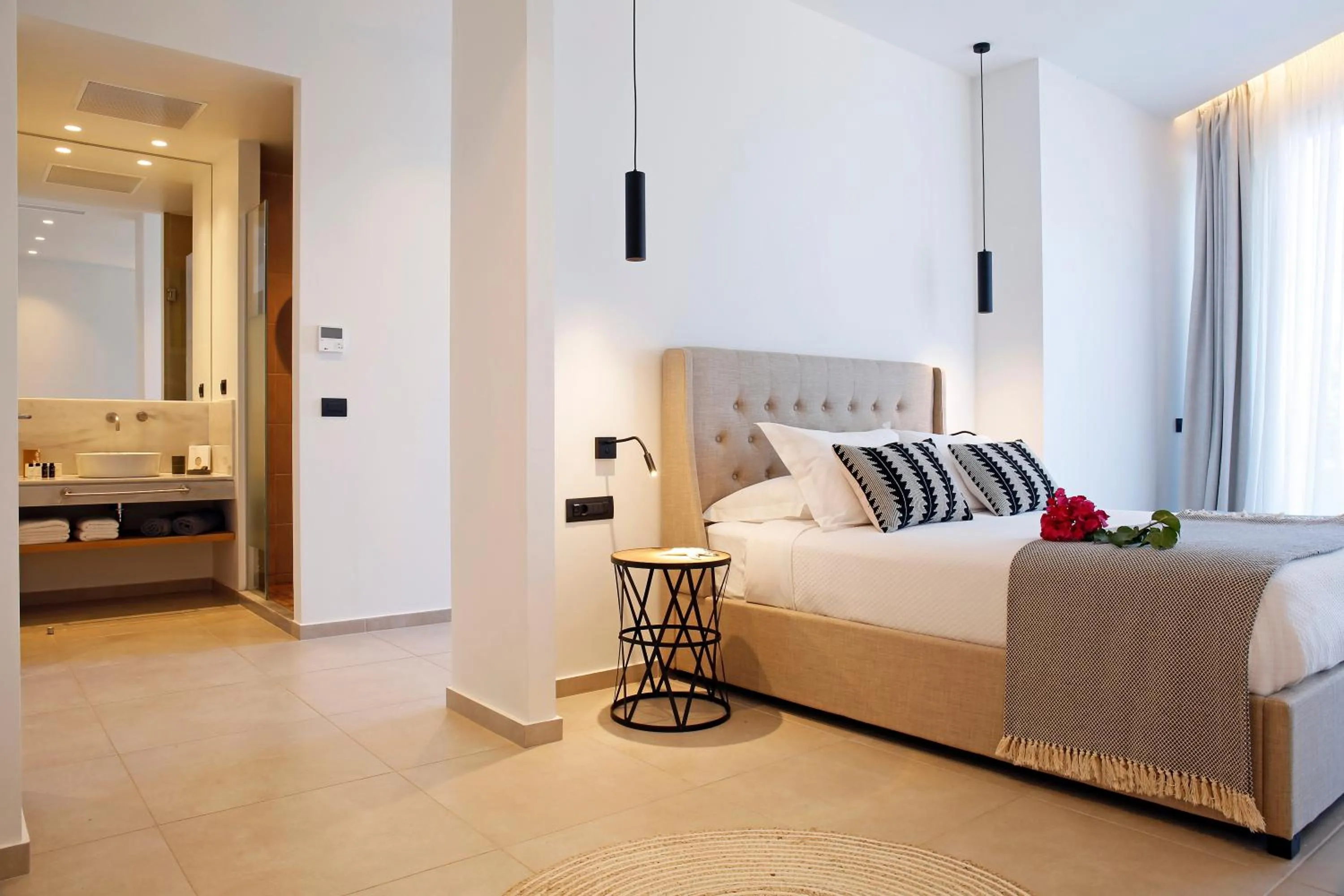 Bed in Oasis Beach Hotel