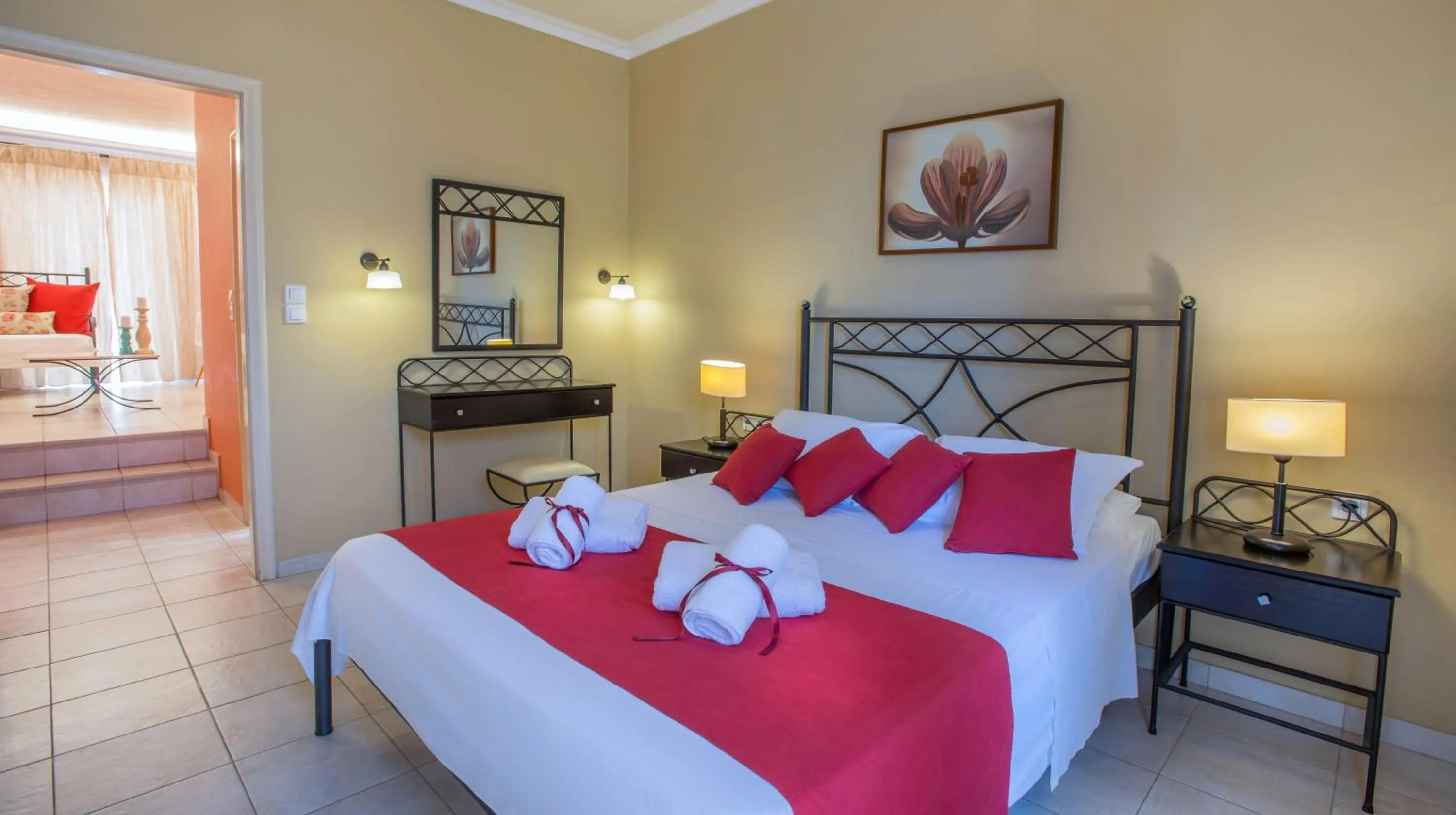 Bed in Oasis Beach Hotel