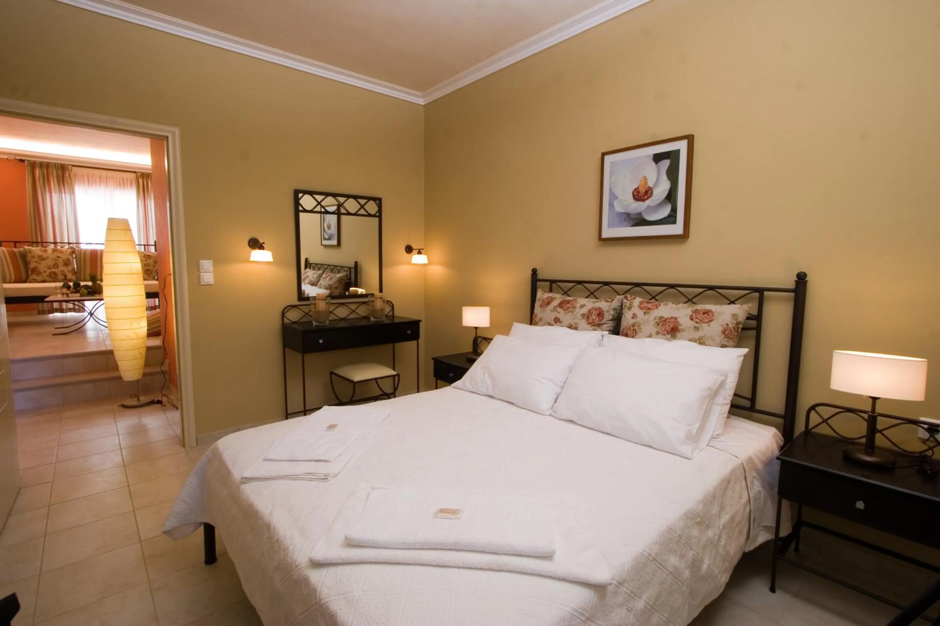 Bed in Oasis Beach Hotel