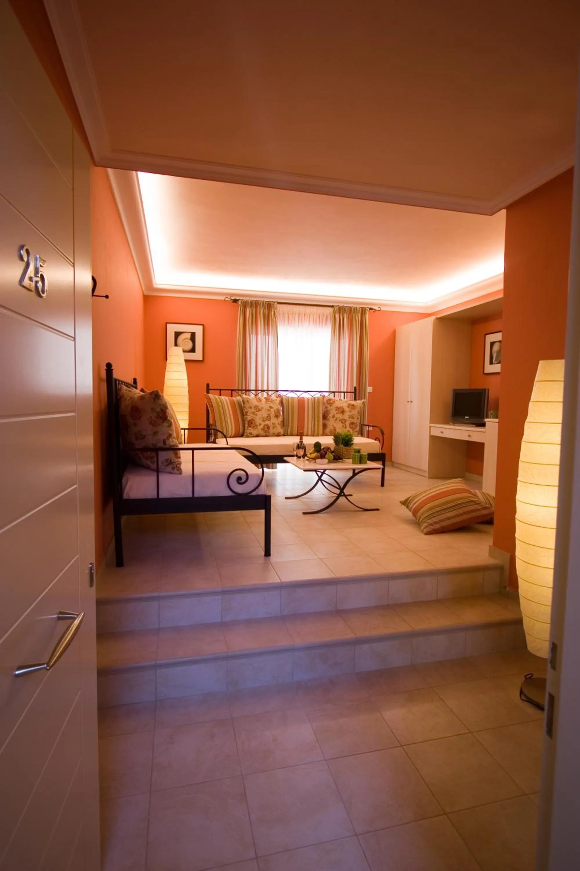 Living room, Bed in Oasis Beach Hotel