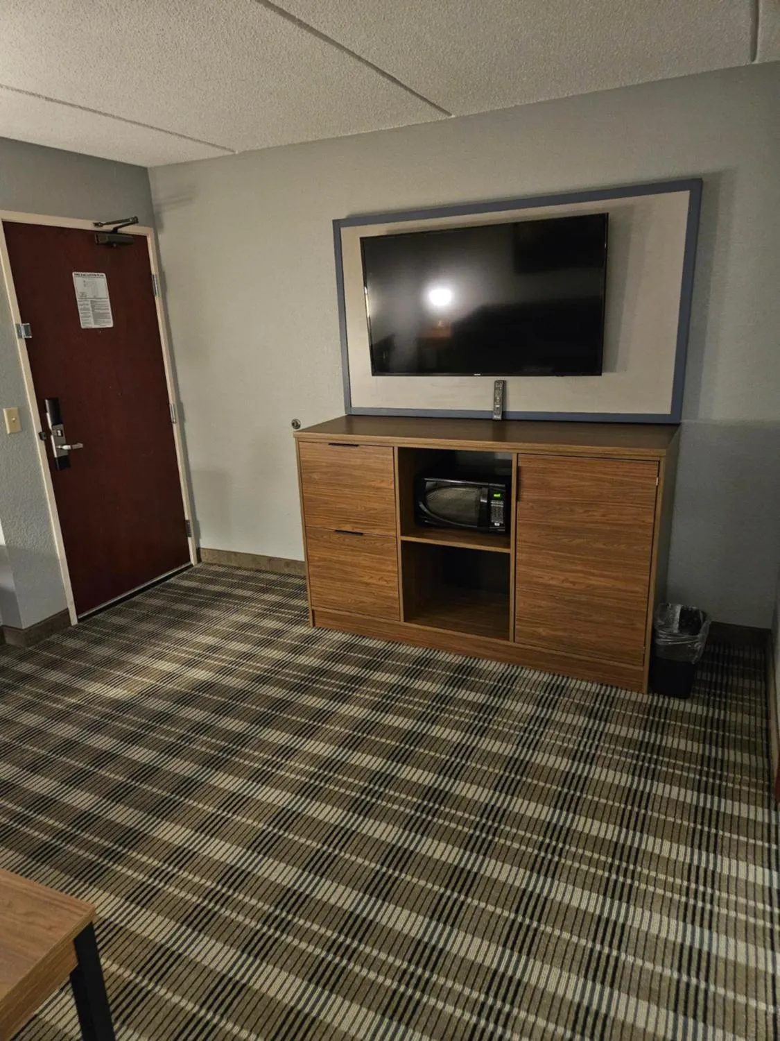 Communal lounge/ TV room in AmericInn by Wyndham Mounds View Minneapolis