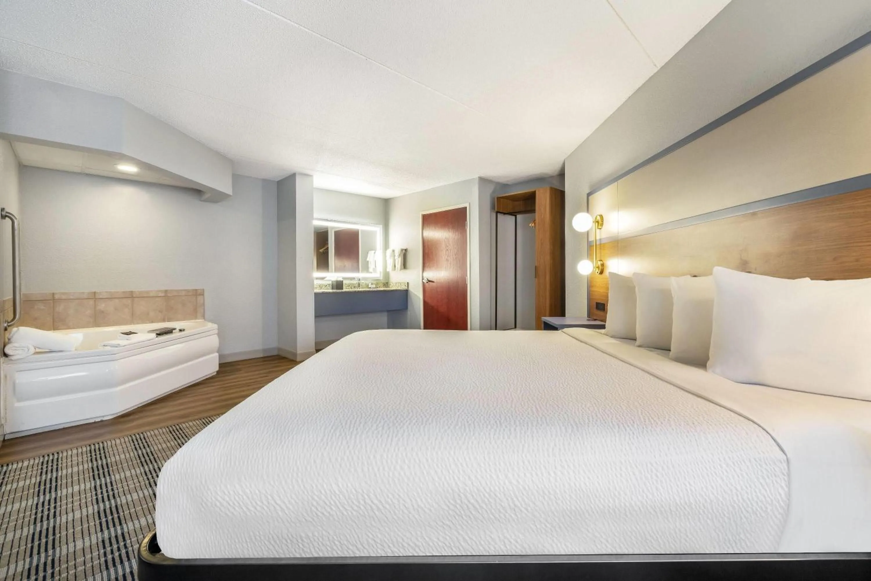 Photo of the whole room, Bed in AmericInn by Wyndham Mounds View Minneapolis