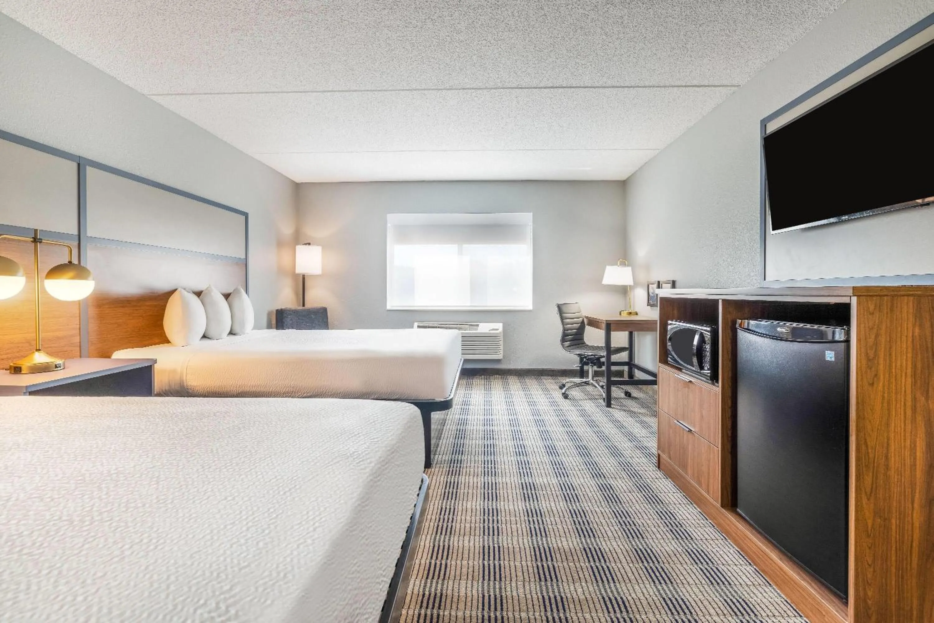 Bed in AmericInn by Wyndham Mounds View Minneapolis