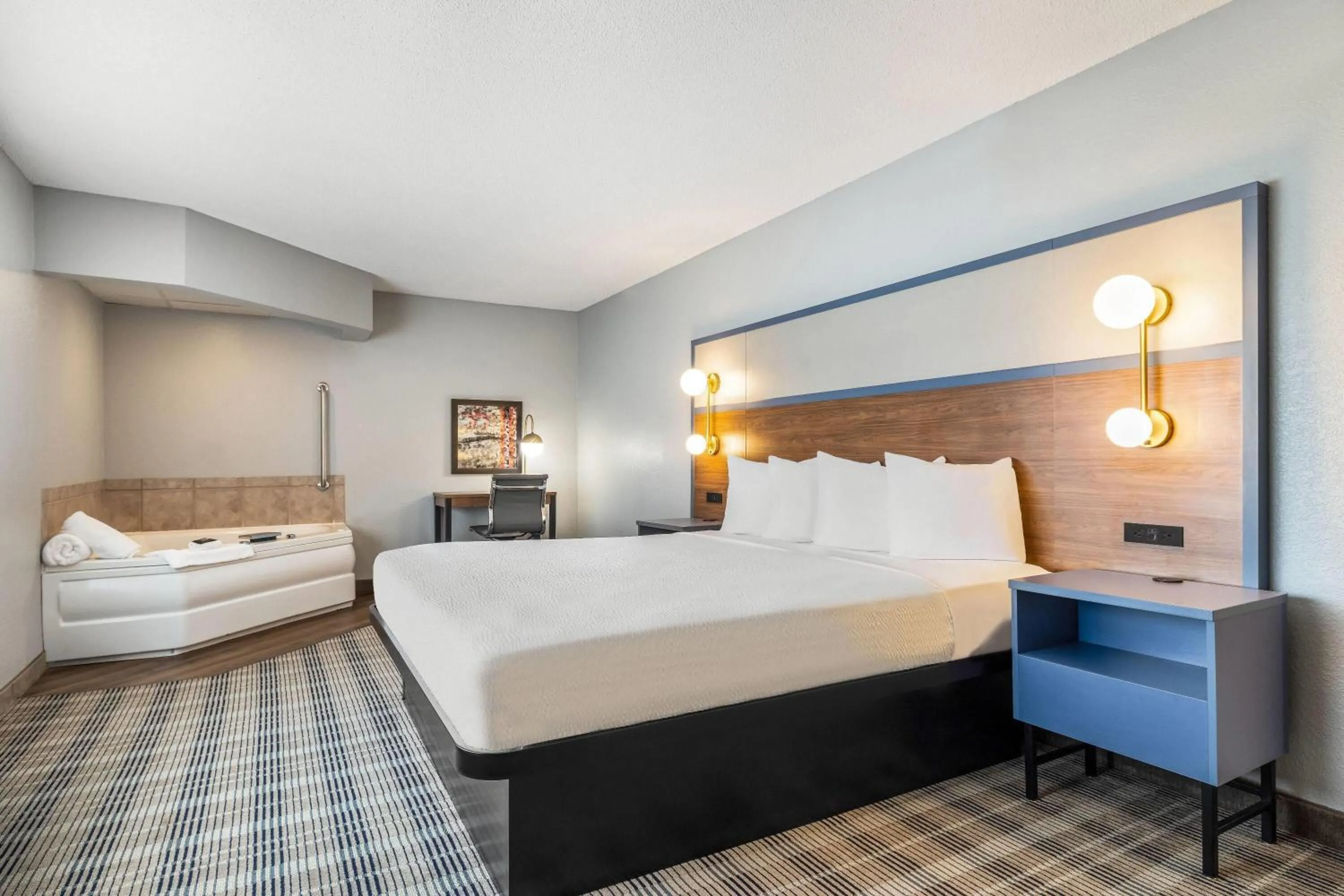 Photo of the whole room, Bed in AmericInn by Wyndham Mounds View Minneapolis