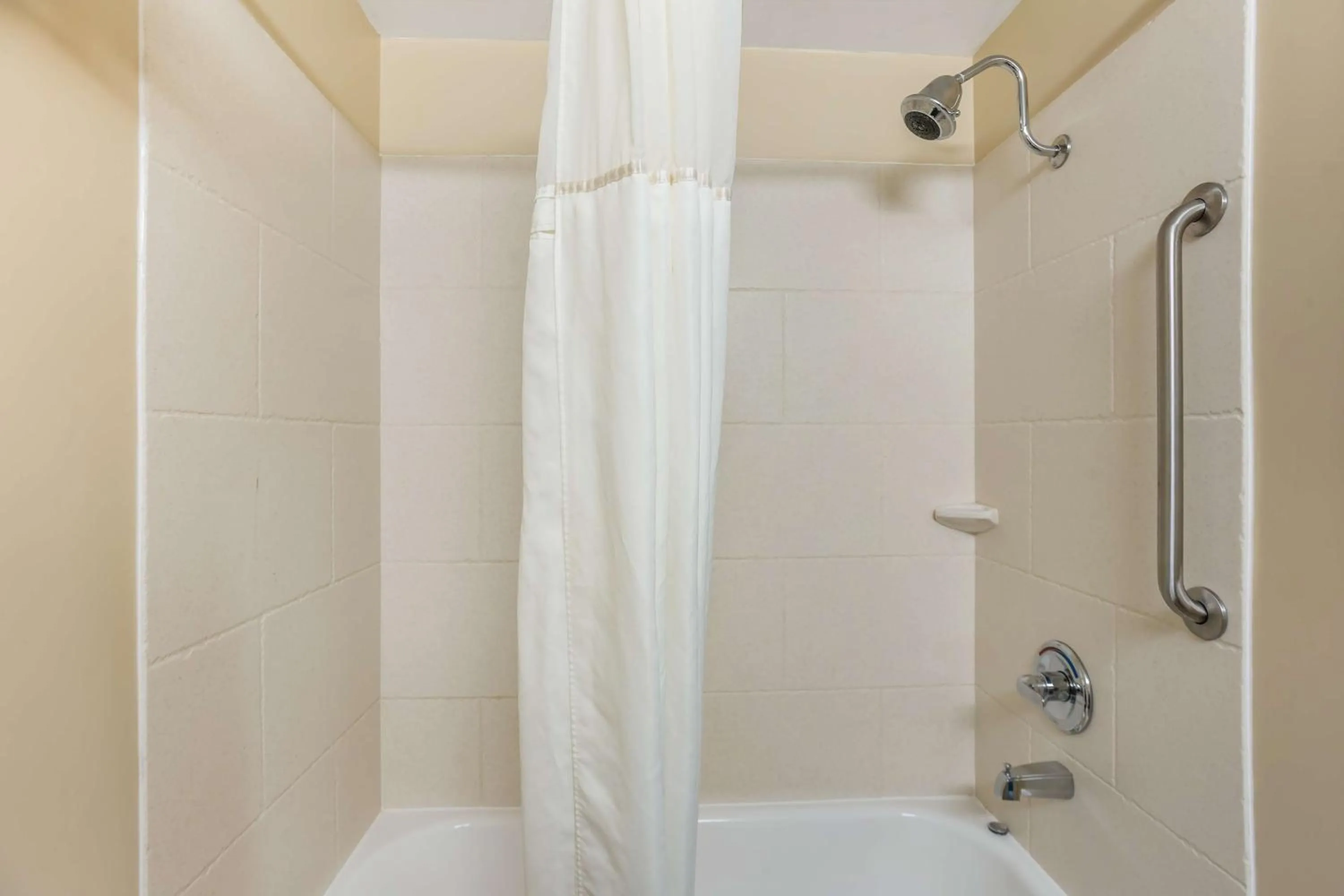 Bedroom in Best Western PLUS University Park Inn & Suites