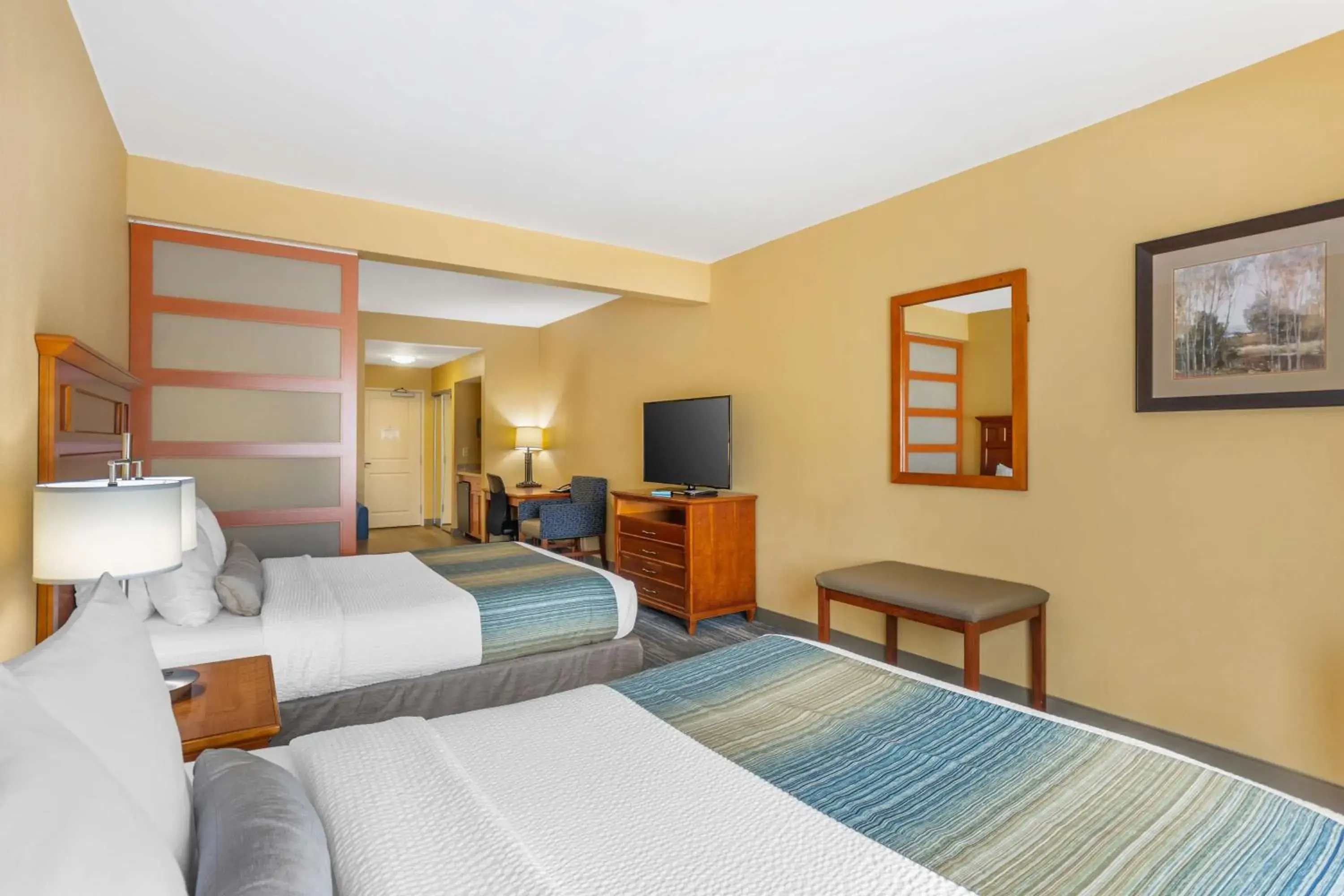 Bedroom, Bed in Best Western PLUS University Park Inn & Suites Bedroom, Bed in Best Western PLUS University Park Inn & Suites