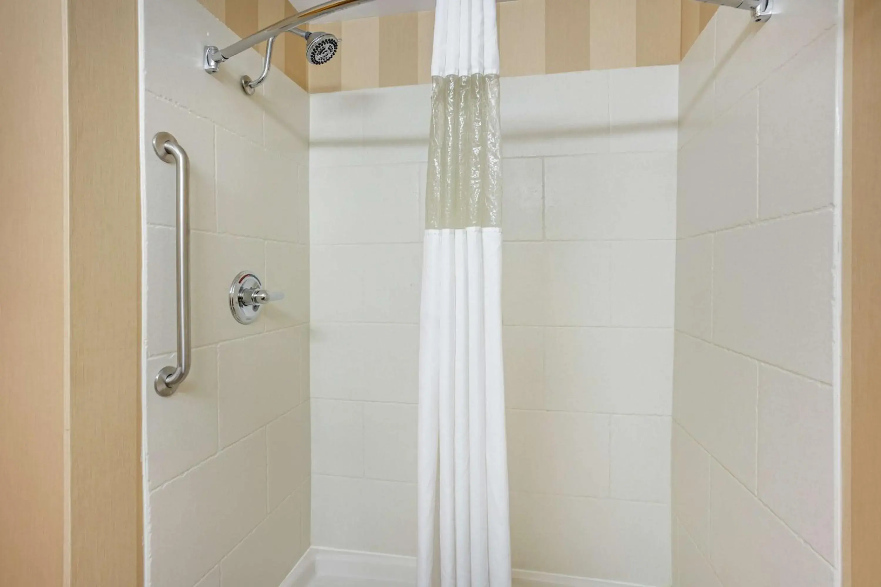 Bathroom in Best Western PLUS University Park Inn & Suites Bathroom in Best Western PLUS University Park Inn & Suites