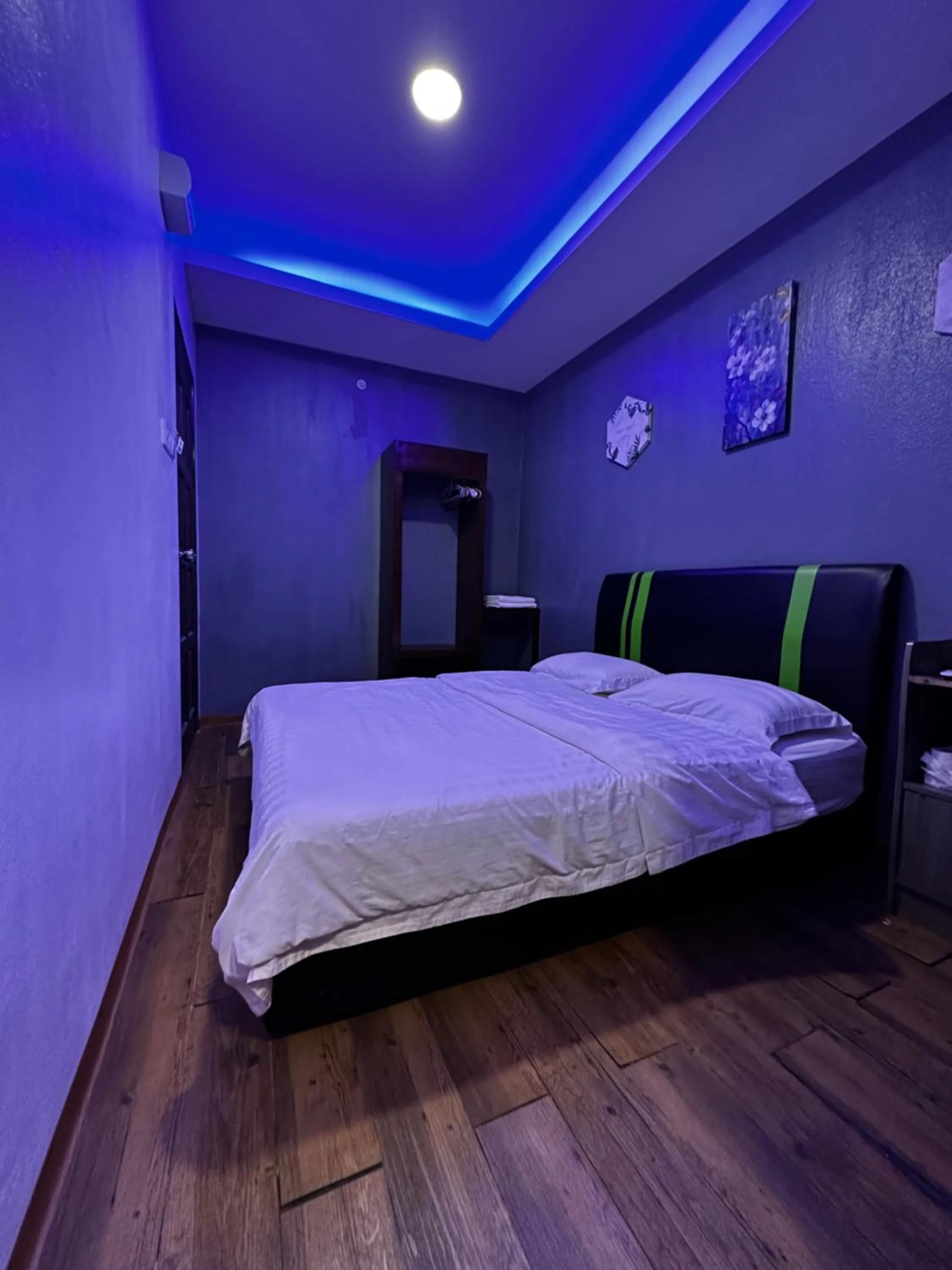 Bed in Cow B Homestay Semporna