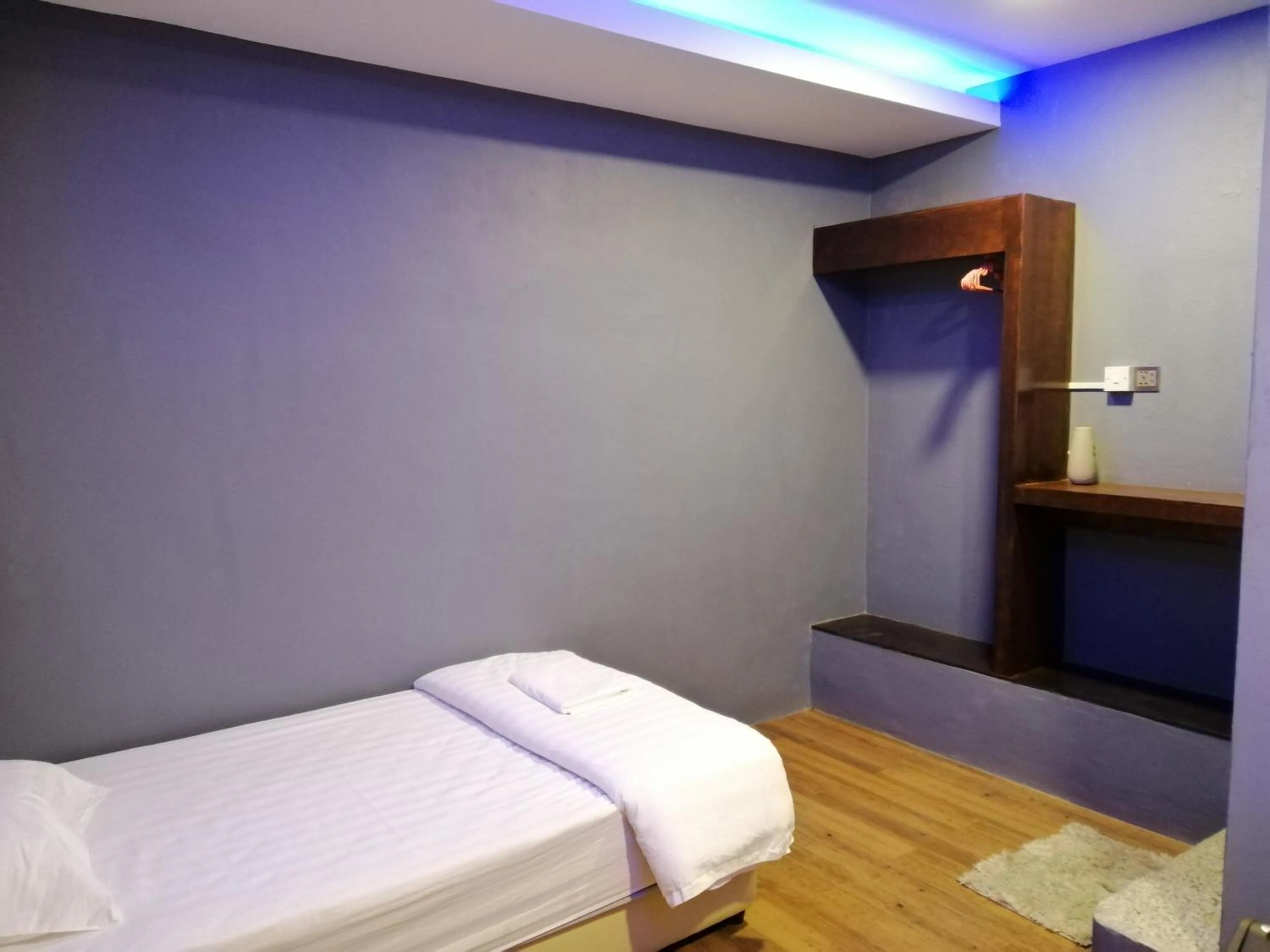 Bed in Cow B Homestay Semporna