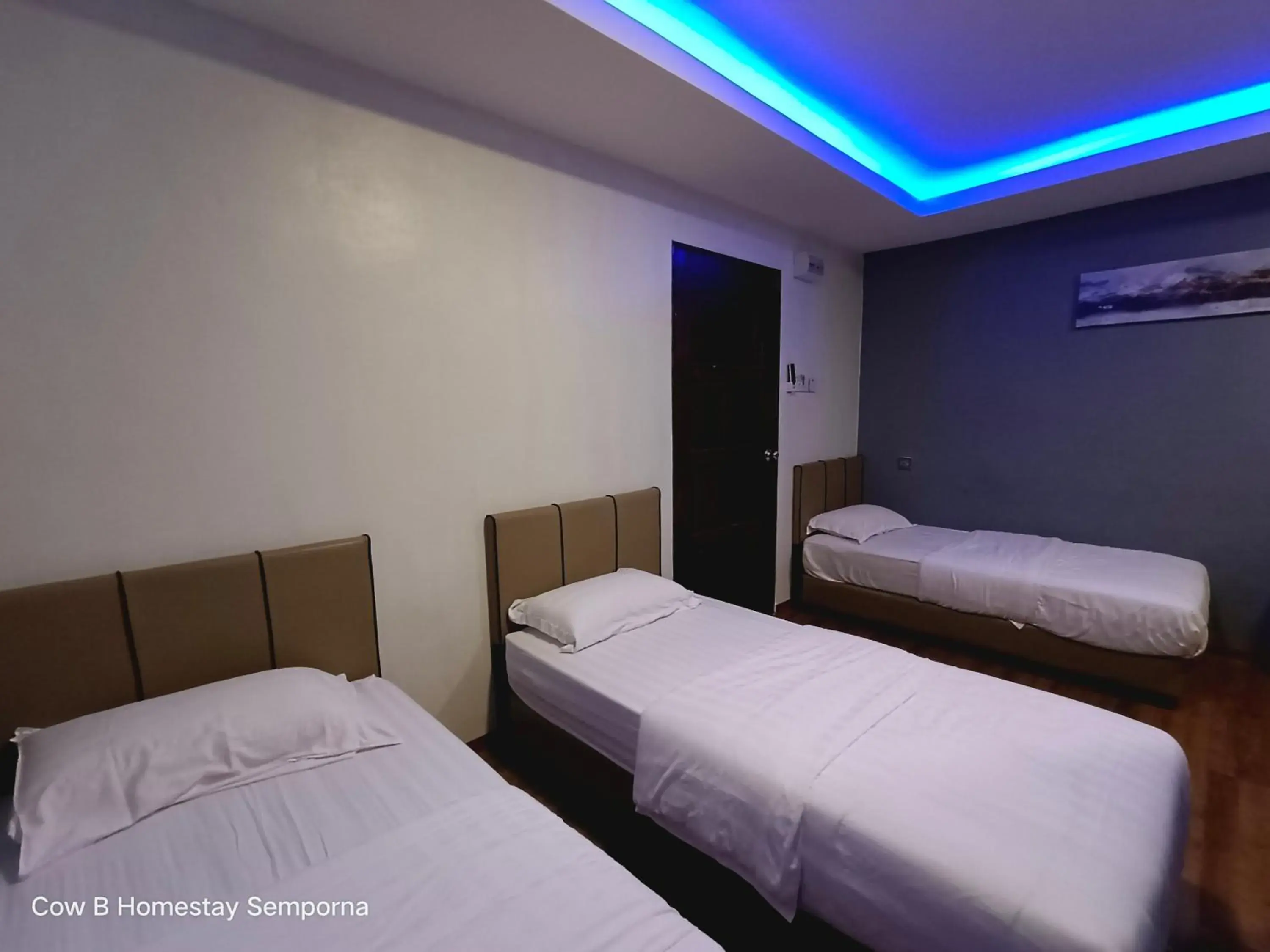 Standard Triple Room in Cow B Homestay Semporna Standard Triple Room in Cow B Homestay Semporna