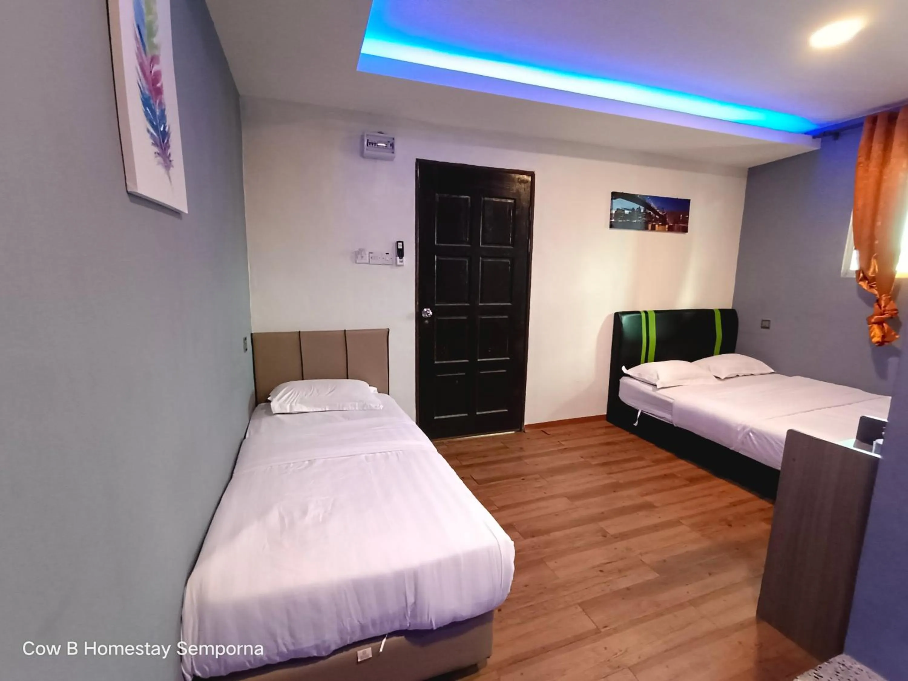 Photo of the whole room, Bed in Cow B Homestay Semporna