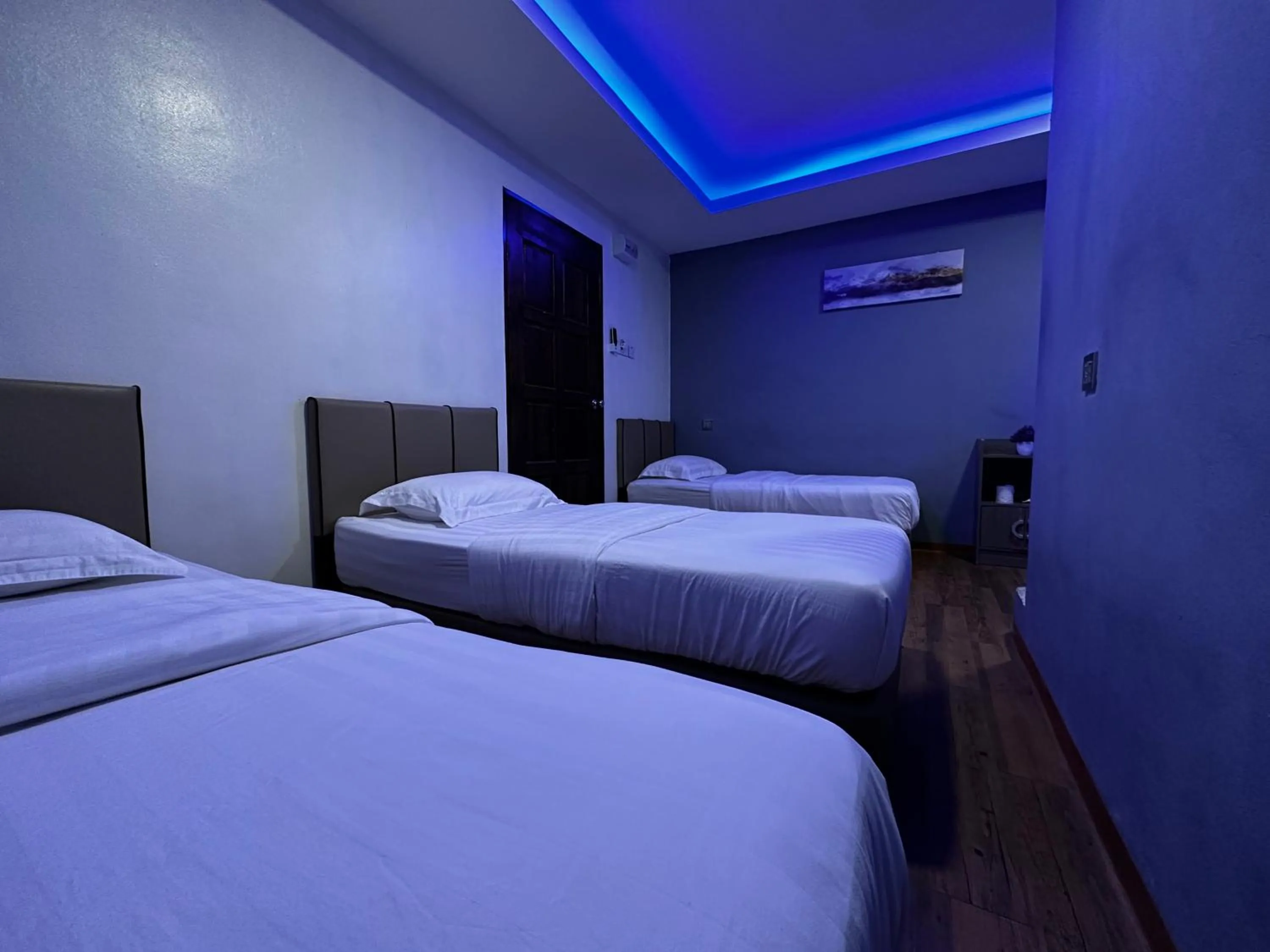 Bed in Cow B Homestay Semporna