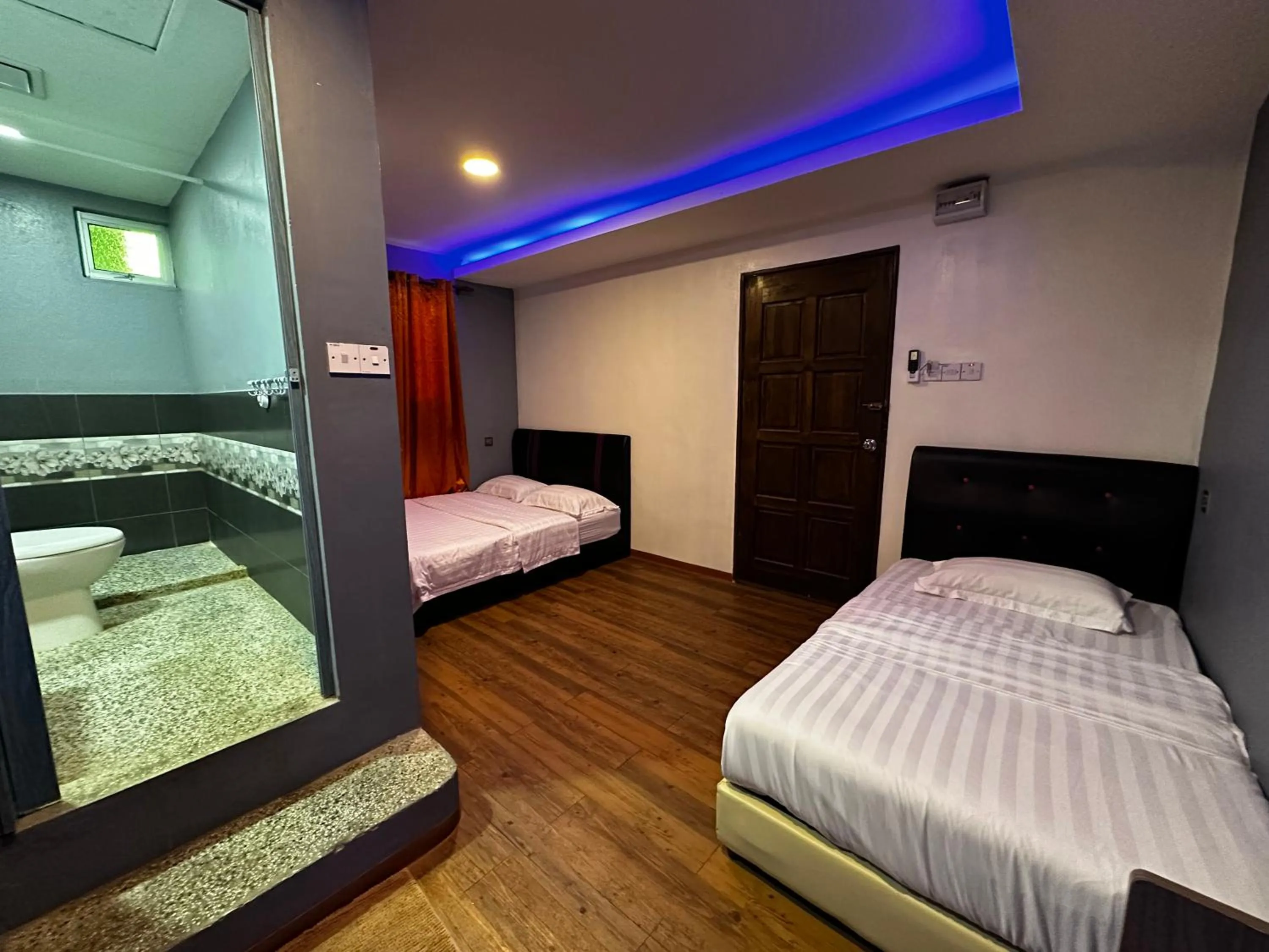 Bed in Cow B Homestay Semporna