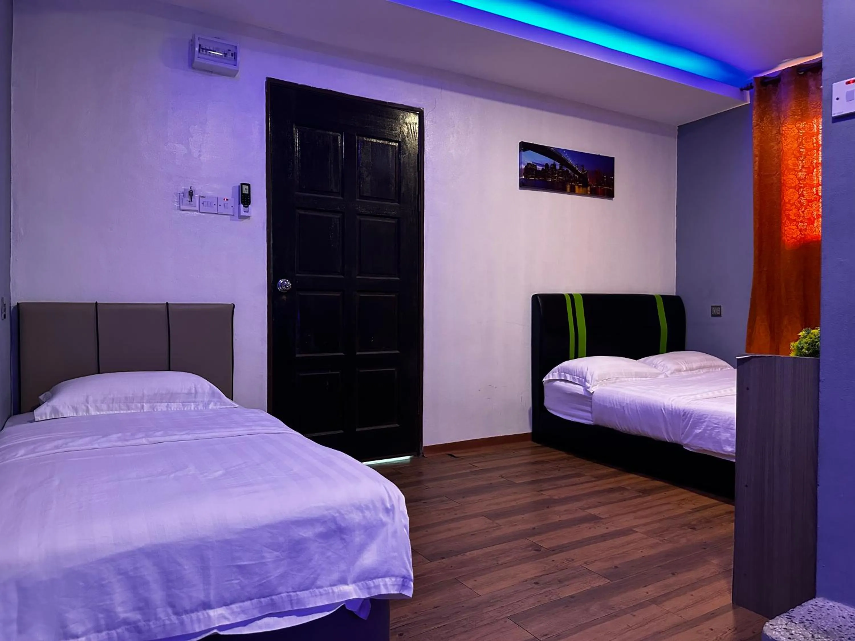 Bed in Cow B Homestay Semporna